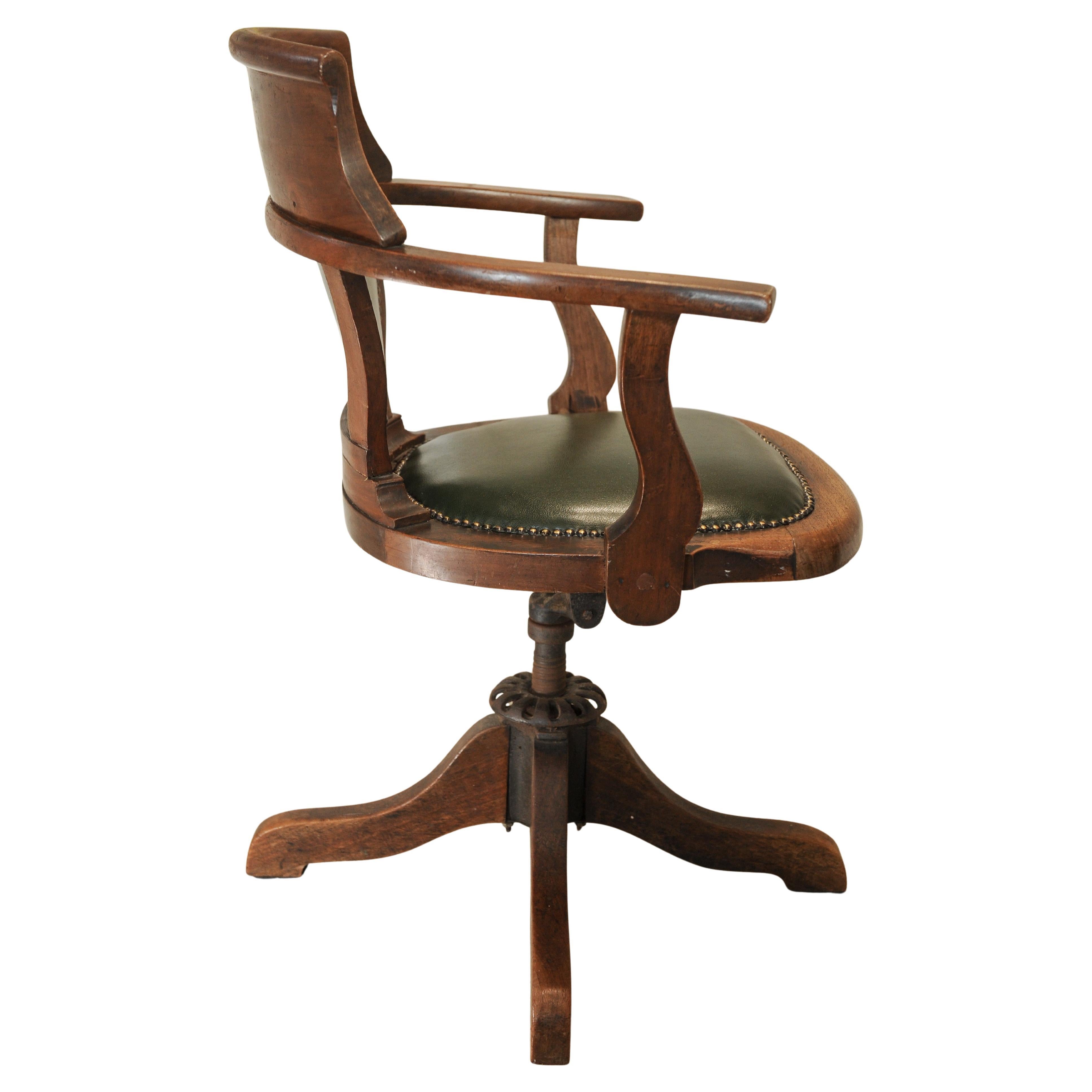 Silla de escritorio giratoria antigua victoriana inglesa de cuero verde y roble en venta 2