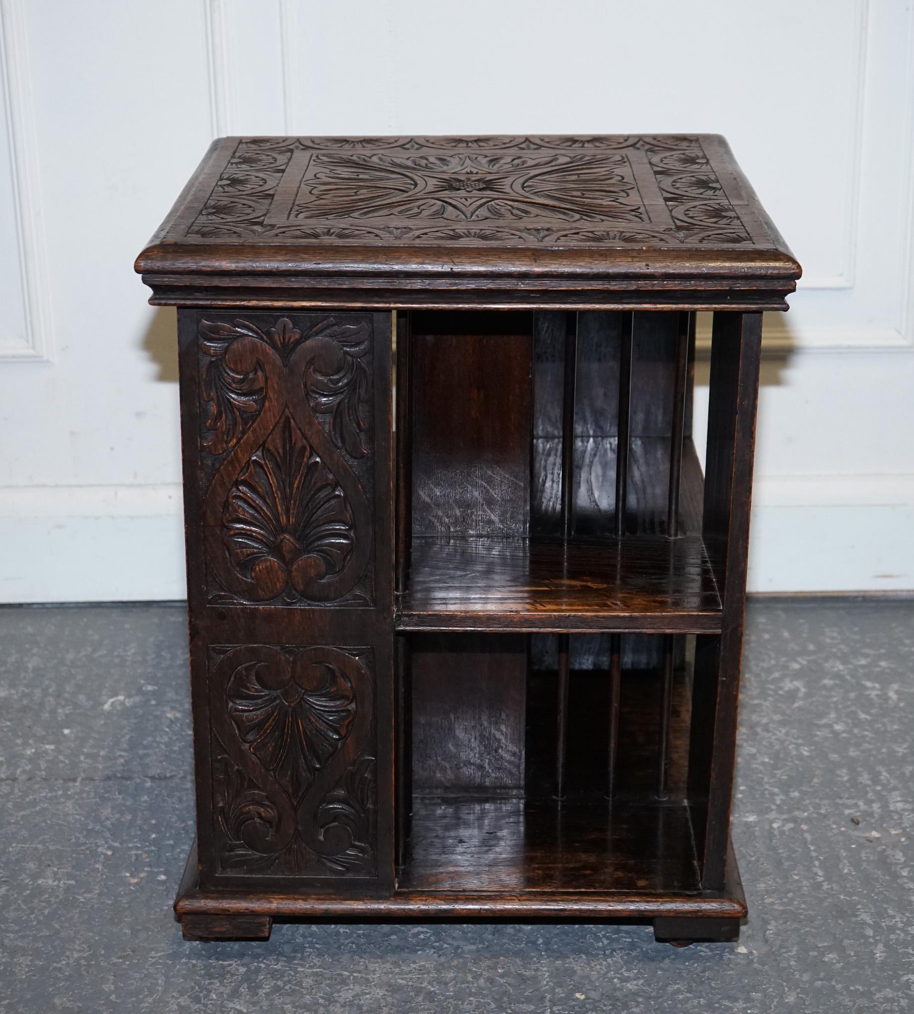 ANTIQUE VICTORIAN ENGLISH SOLID OAK CARVED JACOBEAN REVOLViNG OPEN BOOKCASE For Sale 4