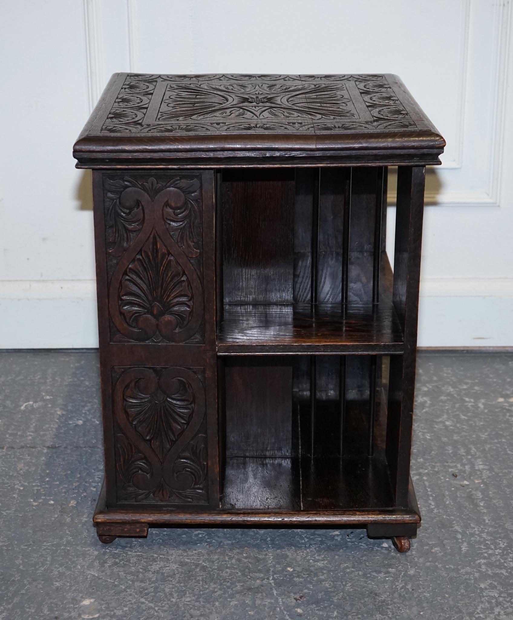 ANTIQUE VICTORIAN ENGLISH SOLID OAK CARVED JACOBEAN REVOLViNG OPEN BOOKCASE For Sale 5