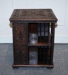ANTIQUE VICTORIAN ENGLISH SOLID OAK CARVED JACOBEAN REVOLViNG OPEN BOOKCASE
