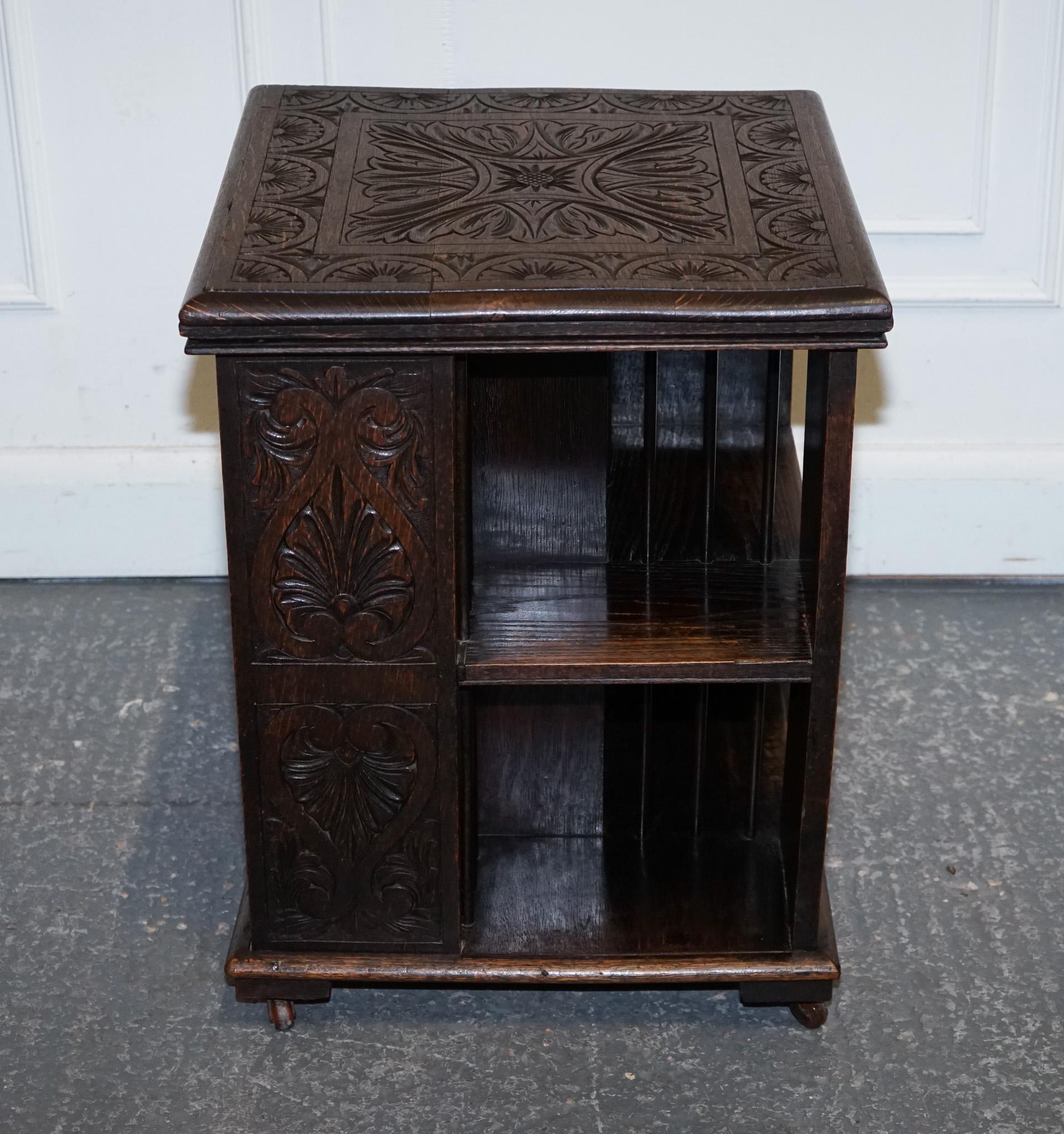 British ANTIQUE VICTORIAN ENGLISH SOLID OAK CARVED JACOBEAN REVOLViNG OPEN BOOKCASE For Sale
