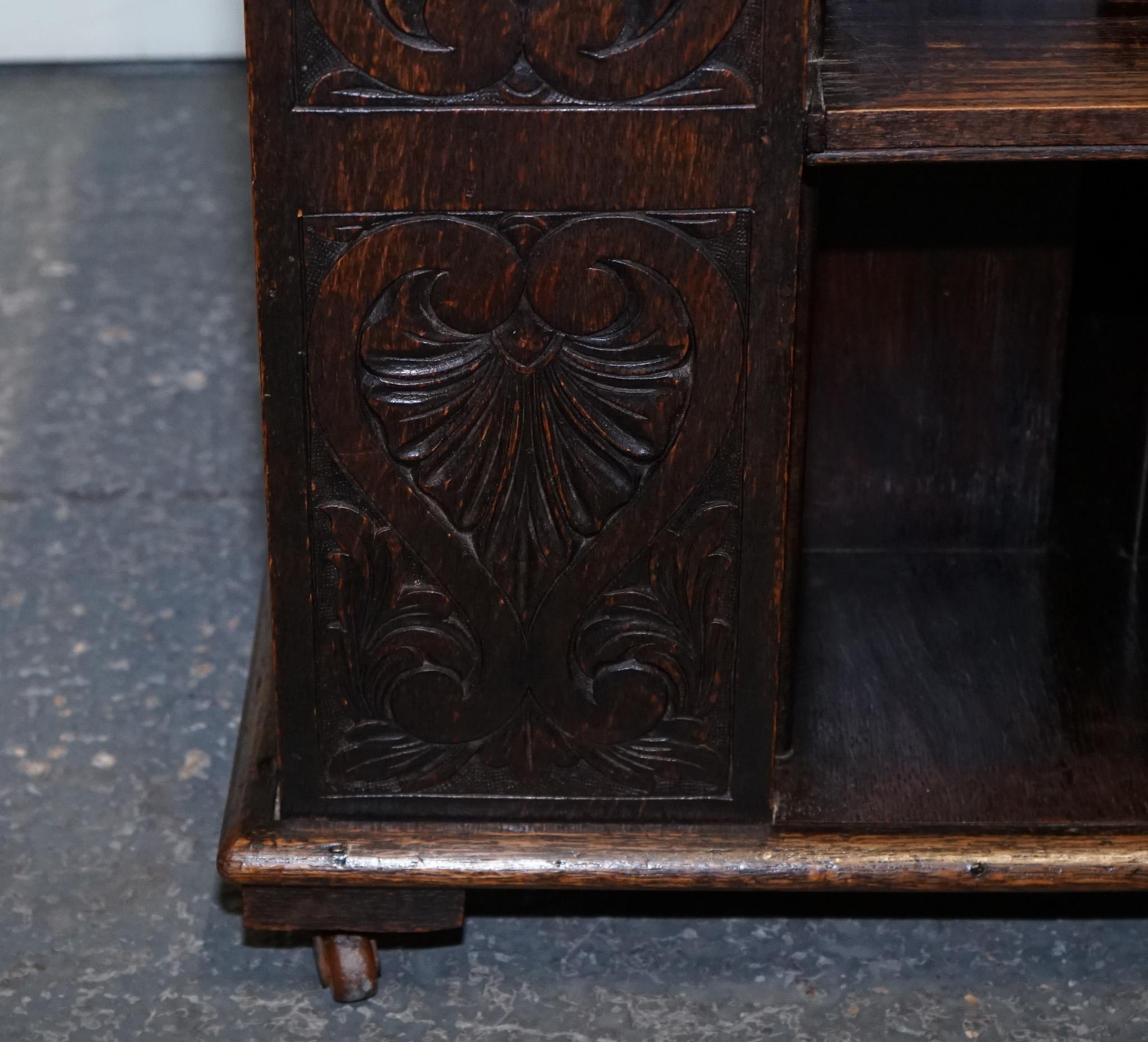 ANTIQUE VICTORIAN ENGLISH SOLID OAK CARVED JACOBEAN REVOLViNG OPEN BOOKCASE In Good Condition For Sale In Pulborough, GB