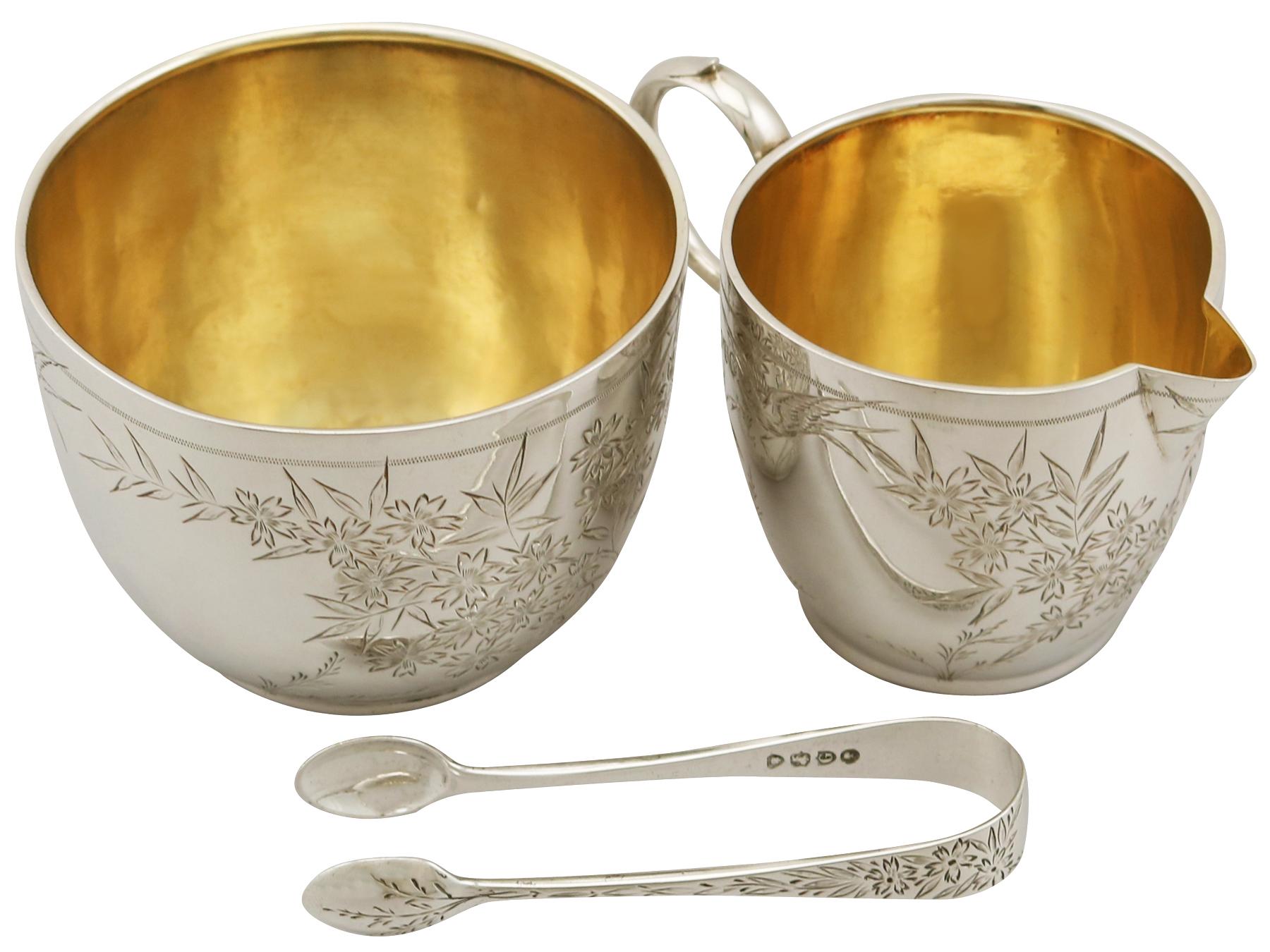 A fine and impressive antique Victorian English sterling silver cream and sugar presentation set - boxed; an addition to our antique teaware collection.

This fine antique Victorian sterling silver afternoon teaware set consists of a cream jug, a