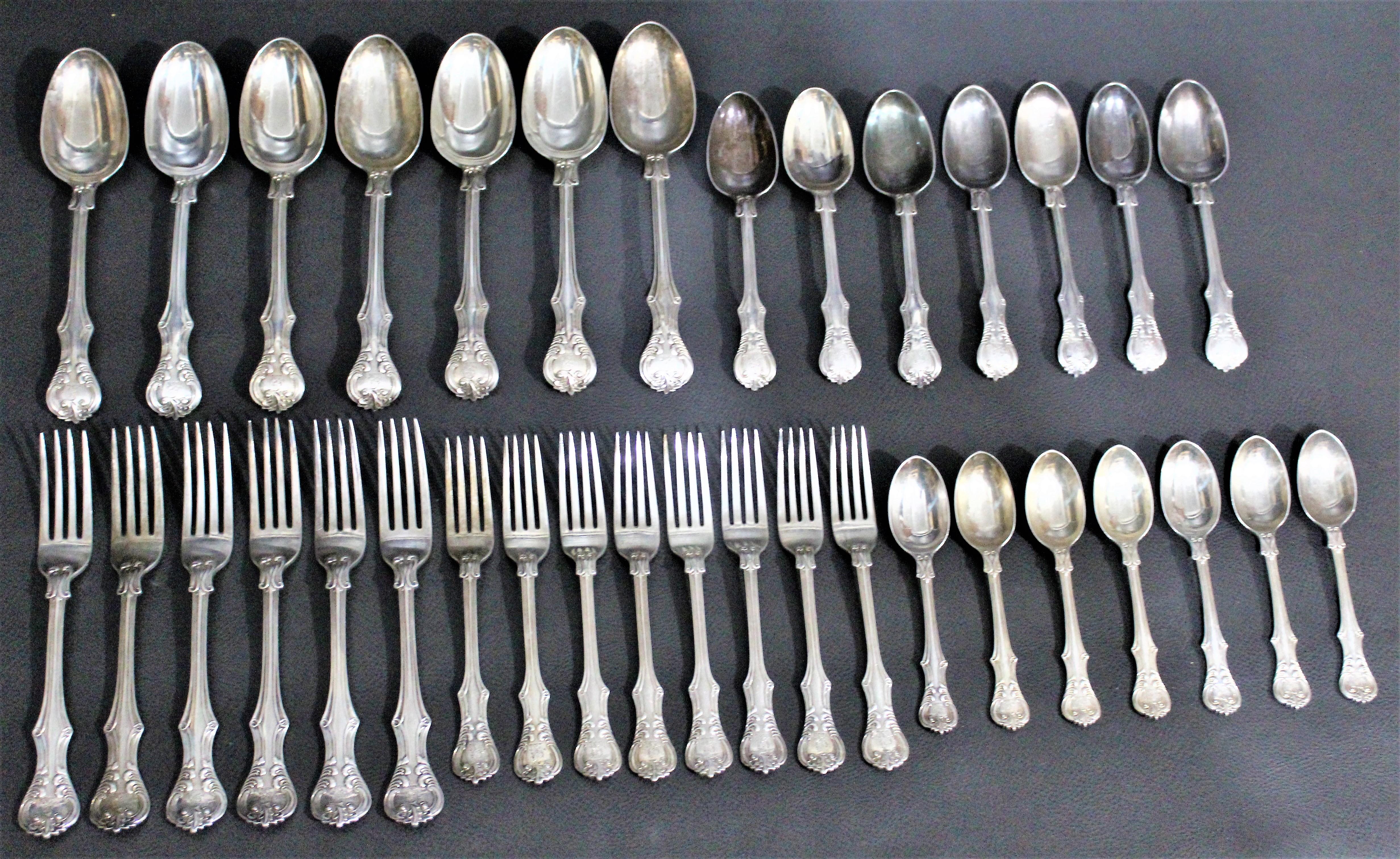 A total of 35 pieces of early Victorian sterling silver English flatware by George Adams, London, dated 1878 in a very rare pattern. Ornately decorated and substantial in their composition, these pieces are being offered in 'As Found' condition as