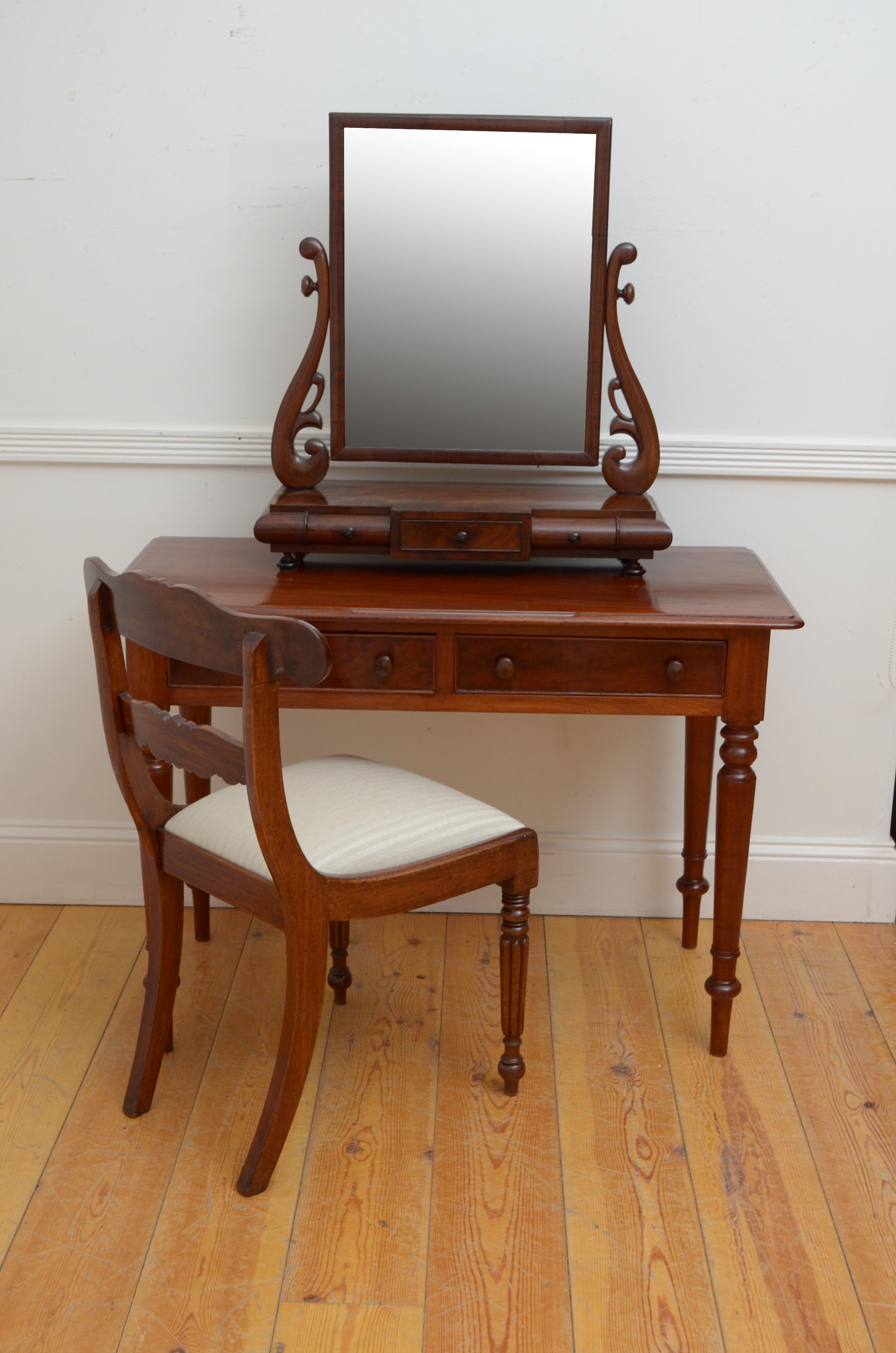 P0305  Fine quality, English solid mahogany Victorian side table / writing table / dressing table, having figured, solid mahogany top with moulded edge above two oak lined drawers with newly lined, clean baize bottoms fitted with cockbeaded edge and