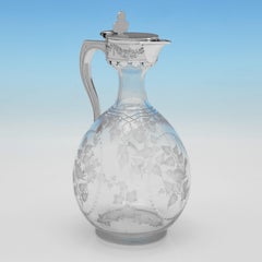 Antique Victorian engraved glass and silver claret jug made in 1868