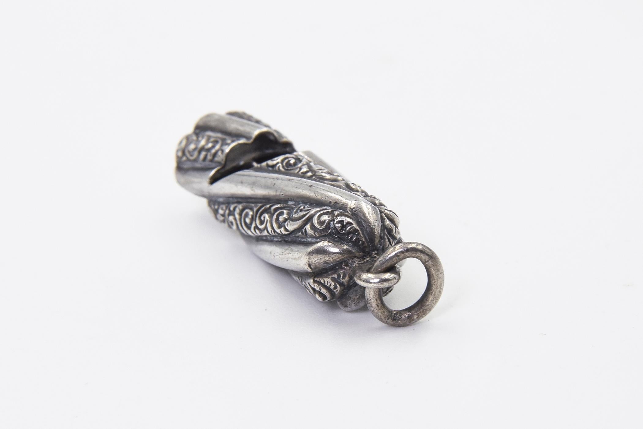 antique silver whistle