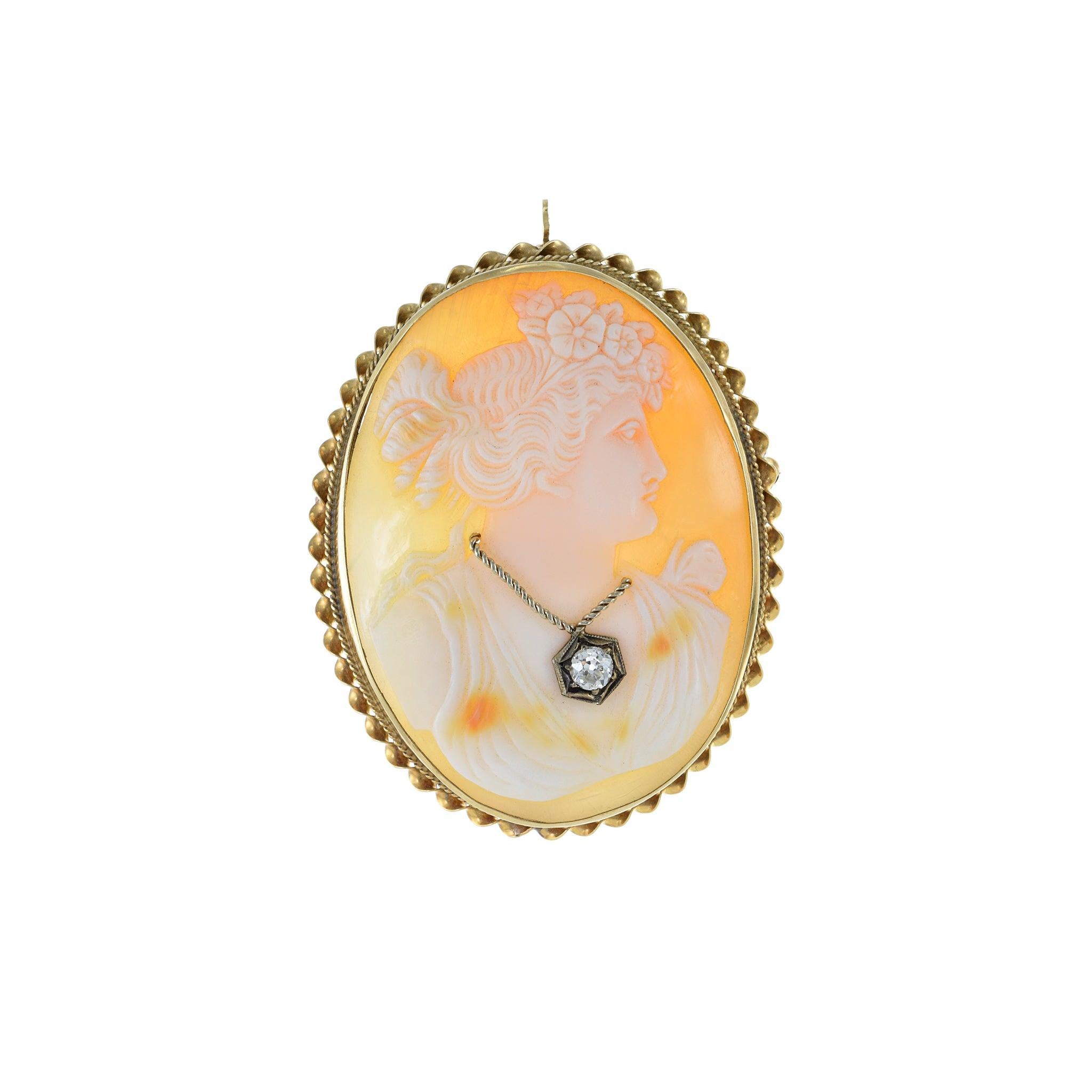 A timeless statement piece that exudes elegance and sophistication. Crafted from 14KT yellow gold, this portrait cameo diamond pin brooch showcases intricate detailing and the finest craftsmanship of the Victorian Era. A stunning combination of