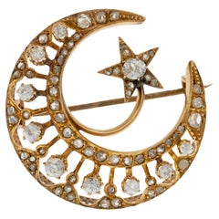 Antique Victorian Era 18KT Gold Sun, Moon, and Stars Brooch with Diamonds