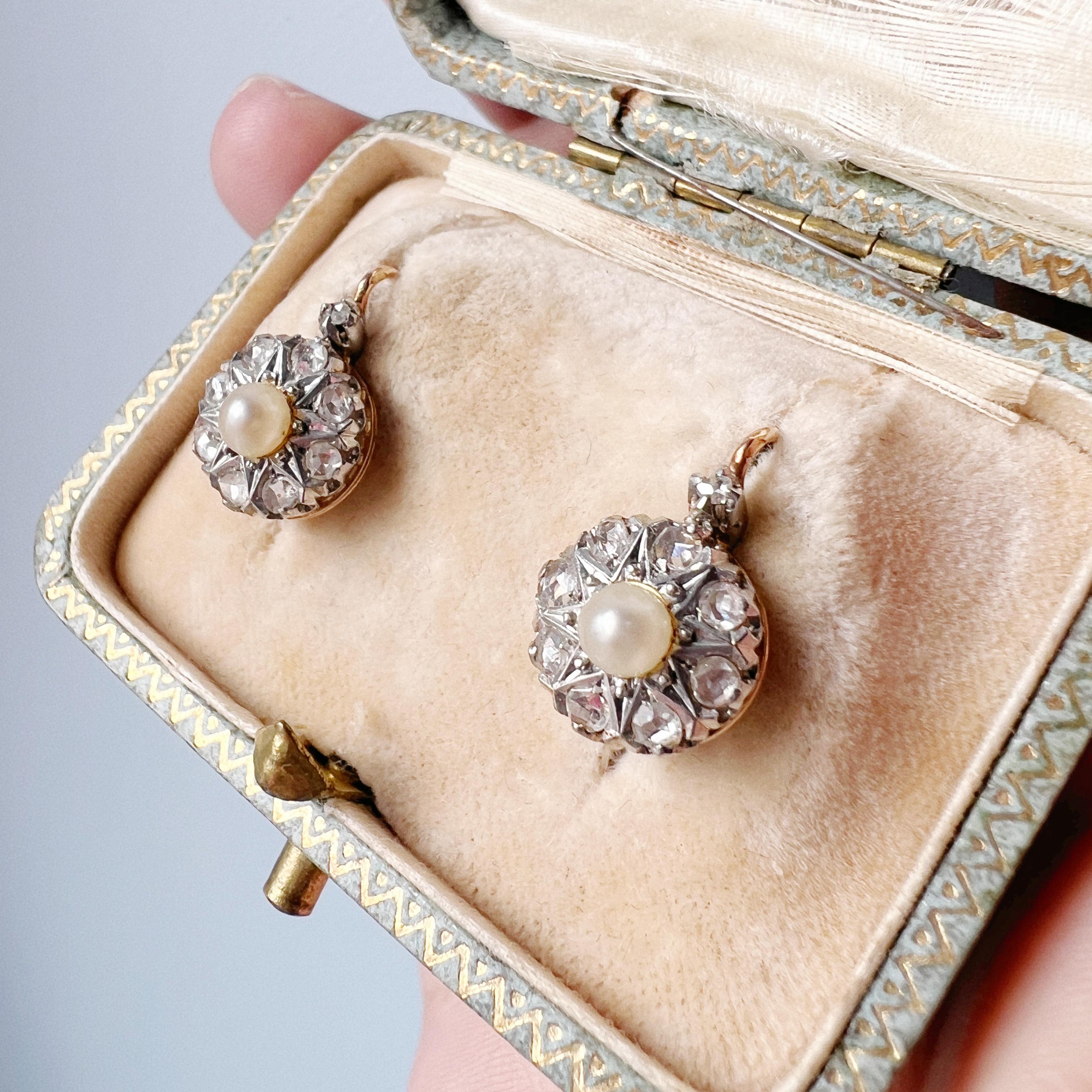 Diamonds and pearls are a classic combination which never goes out of style. The two gems complement each other perfectly, with pearls softening the bling factor of diamonds. 

For sale a beautiful pair of earrings made during the 19th century, the