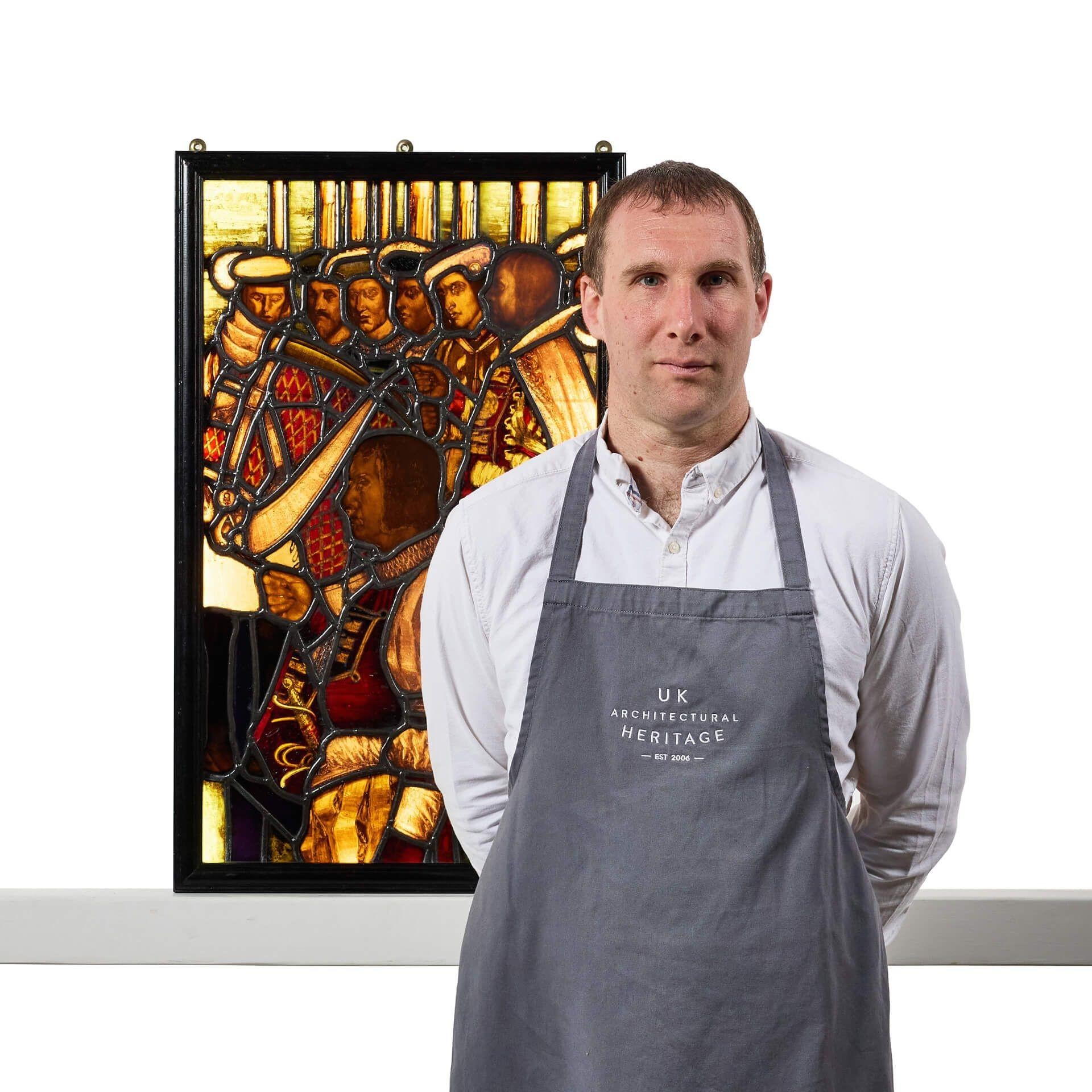 An antique Tudor style stained glass panel attributed to Williams, Gamon & Co dating to circa 1900. Burtonwood Brewery, Warrington. 

The scene depicts a Pre-Raphaelite style and secular image, possibly depicting the Field of the Cloth of Gold where