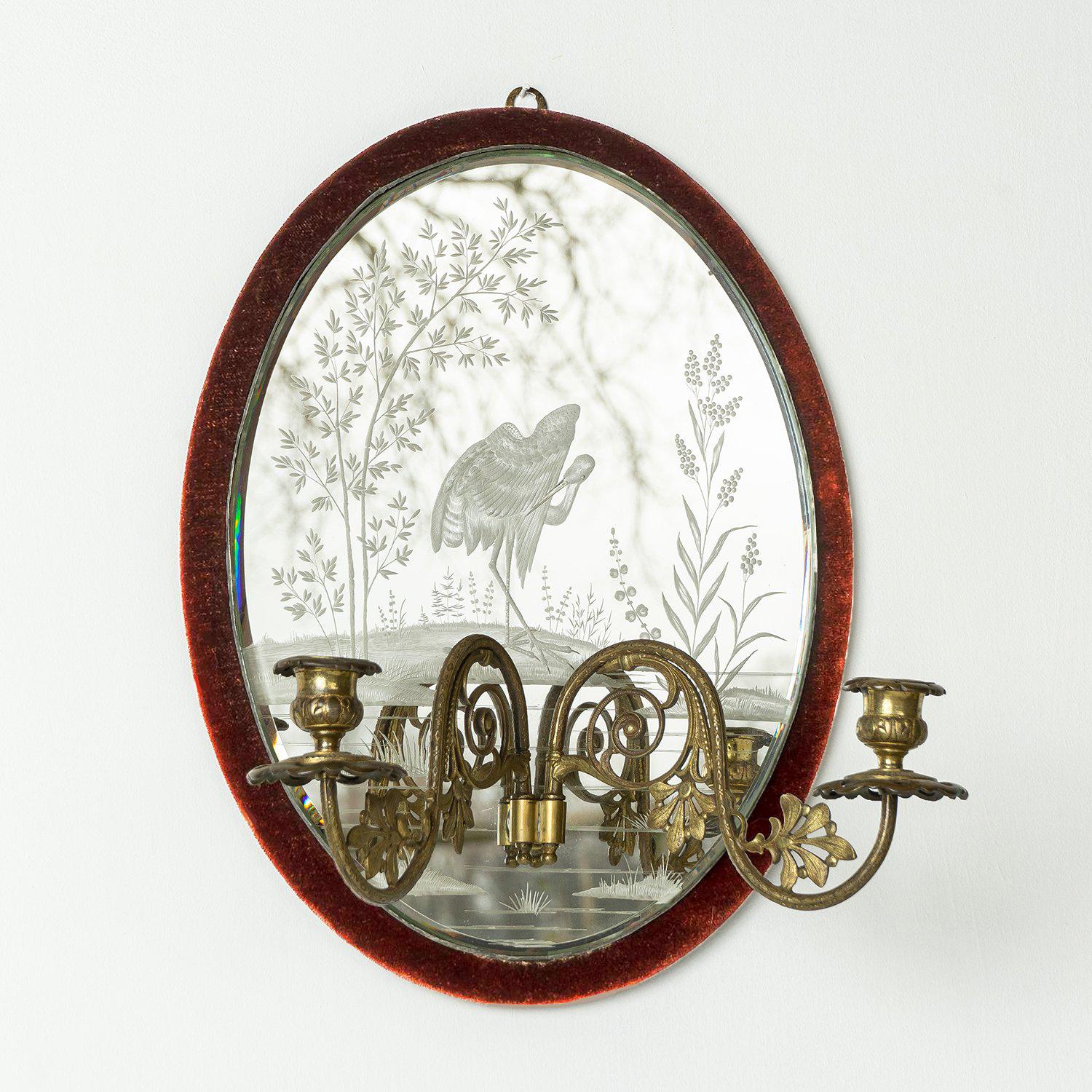 Aesthetic Movement Mirror with Pictorial Natural Scene Etching Depicting a Stork

Excellent quality etching depicting a stork in its natural habitat on the reverse side of the mirror glass.

Bevelled-edged oval glass with a dark red velvet