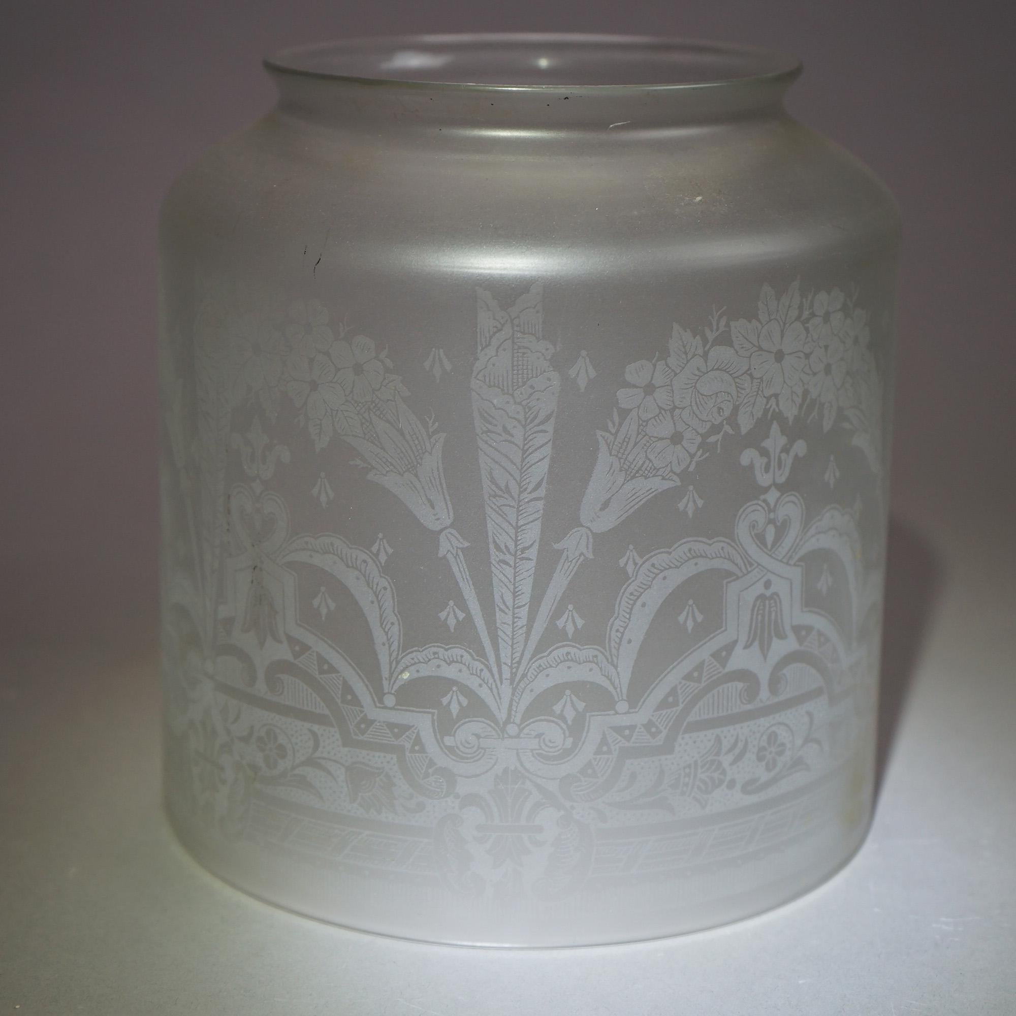 An antique Victorian hall light shade offers frosted glass construction in cylindrical form with etched floral and foliate design, c1890

Measures - 7.25