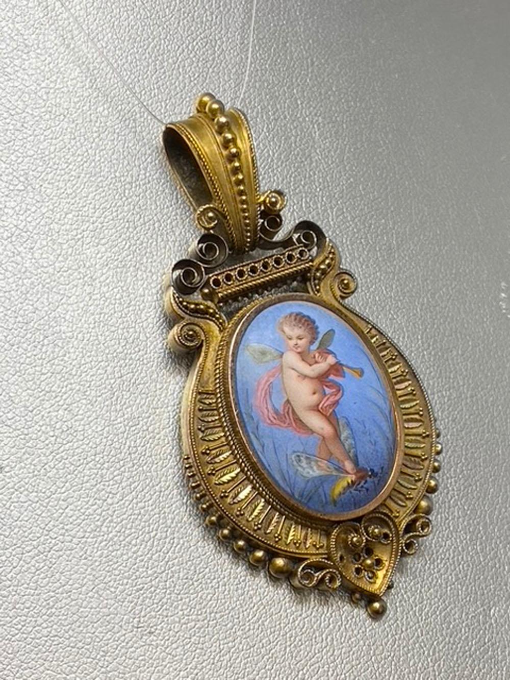 Unknown Victorian Etruscan Revival 14-Karat Yellow Gold and Enamel Cupid Pendant Locket