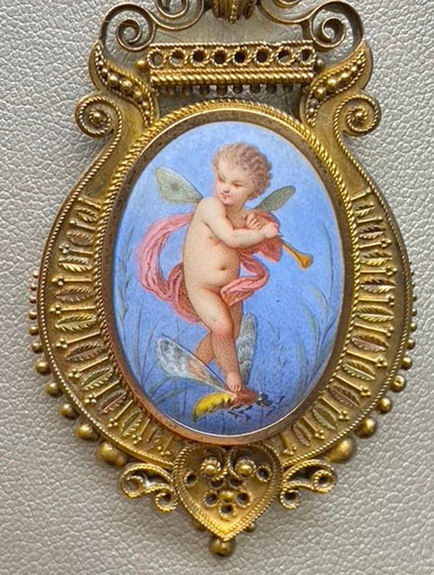 Enameled Victorian Etruscan Revival 14-Karat Yellow Gold and Enamel Cupid Pendant Locket