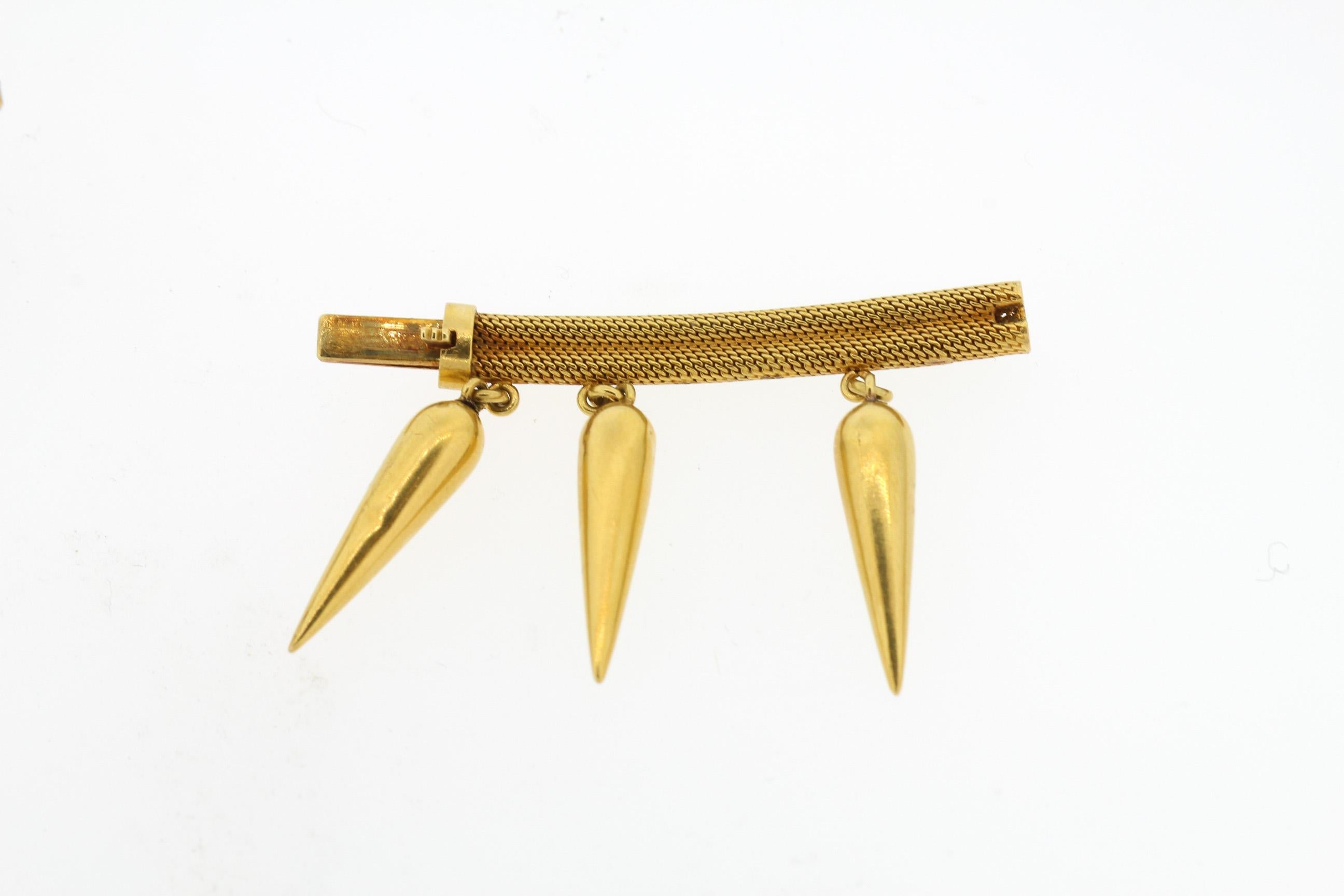 Gorgeous antique Etruscan Revival 18k gold dart fringe necklace circa 1880. This necklace has such a beautiful buttery gold hue. The necklace is made with an extension, so it is 13 inches long without the extension and 14 inches long with it. We
