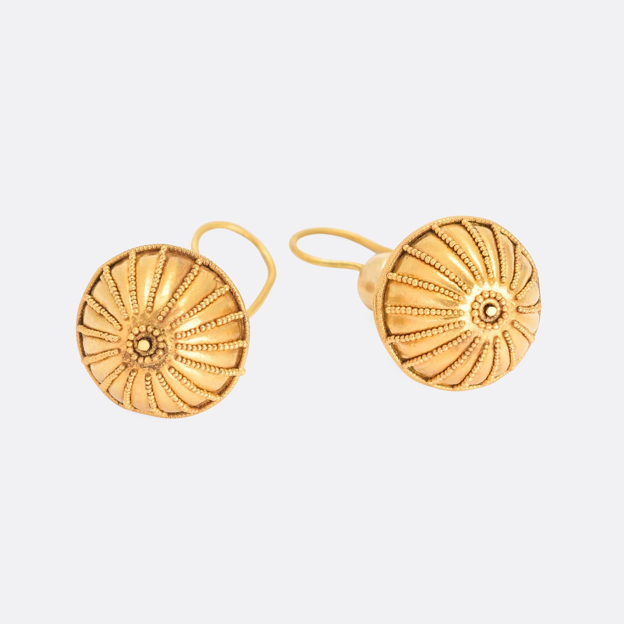 A fine pair of Etruscan Revival orb earrings, featuring the intricate applied granular goldwork typical of the style. They date from the 1870s, and are a particularly wearable example of the period - they can all too often be larger scale, bulkier