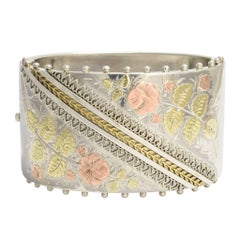 Antique Victorian Etruscan Revival Silver Bangle with Applied Gold Floral Motifs