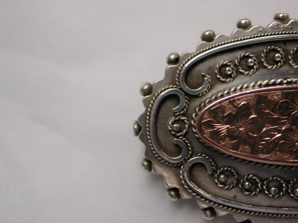 Etruscan Revival Antique Victorian Etruscian Silver Brooch with Engraved Oval 9 Carat Centre 1880 For Sale