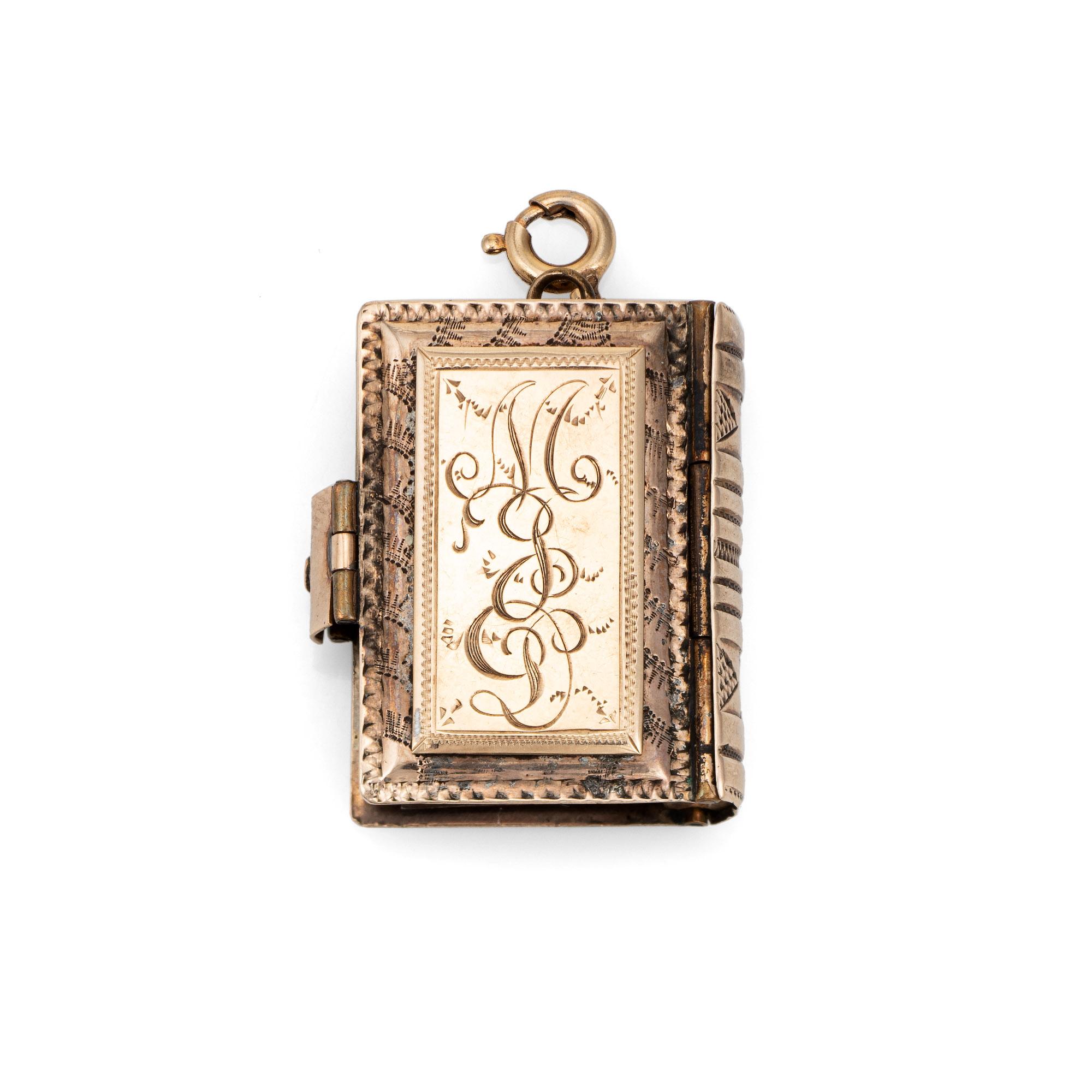 The beautifully detailed locket opens to reveal 7 hinged sepia toned original photos set within ornate frames (and 1 empty frame). The exterior of the locket features finely detailed decorative emblems, chased on both sides. The inside of the charm