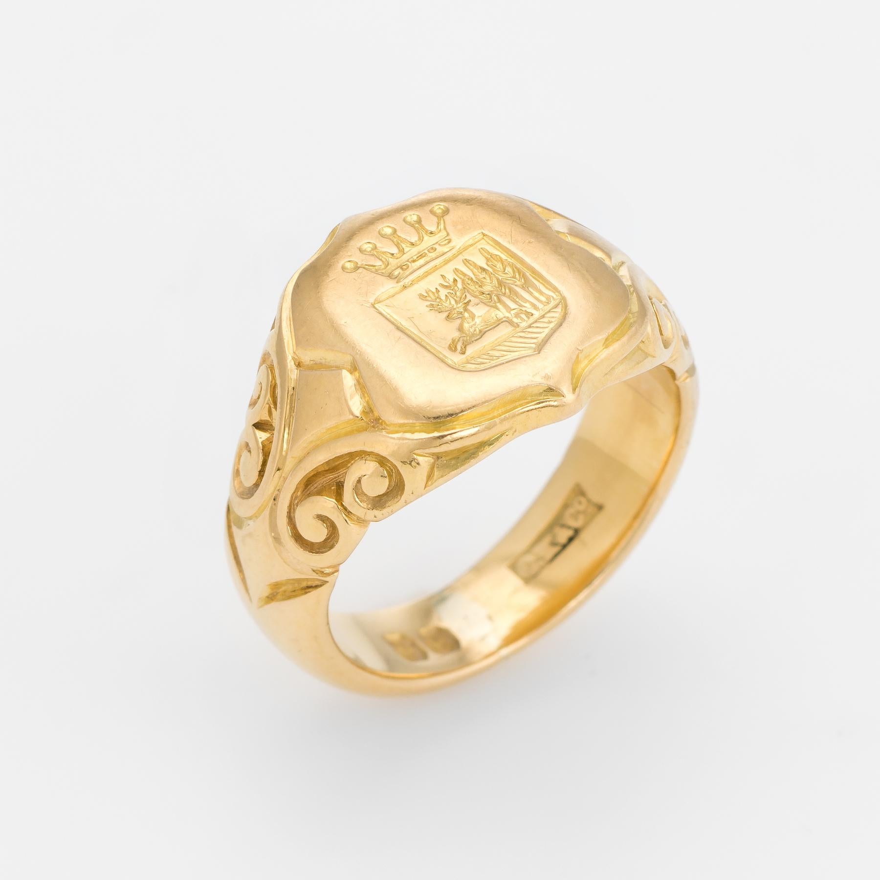 Finely detailed Men's antique Victorian era signet ring (circa 1880s to 1900s), crafted in 18 karat yellow gold. 

The shield shaped mount features a family crest with a deer appearing to bound from three wheat sheaves (possible reference to