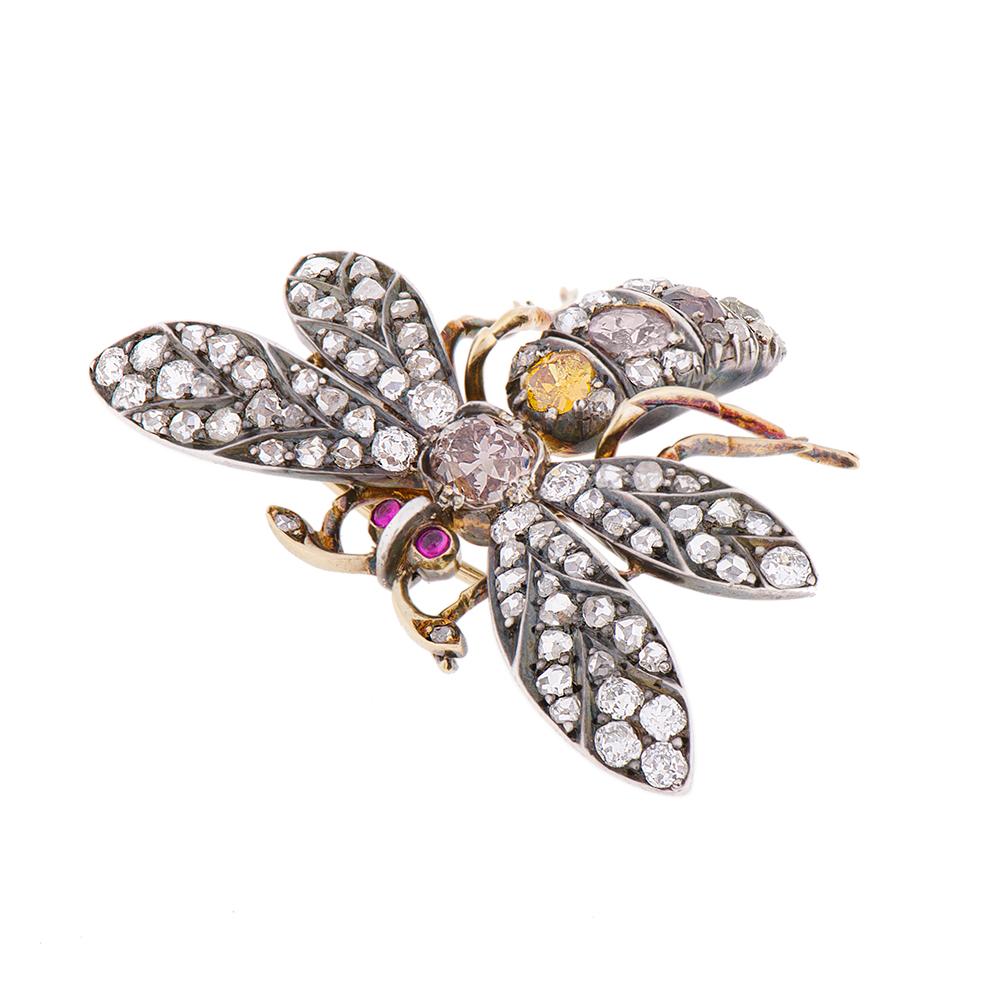 A very fine Victorian bee brooch set with an eye-catching array of various fancy-coloured and white diamonds. The thorax and abdomen adorned with cushion-, oval- and round brilliant-cut fancy-coloured diamonds, such as fancy pinkish-brown, fancy