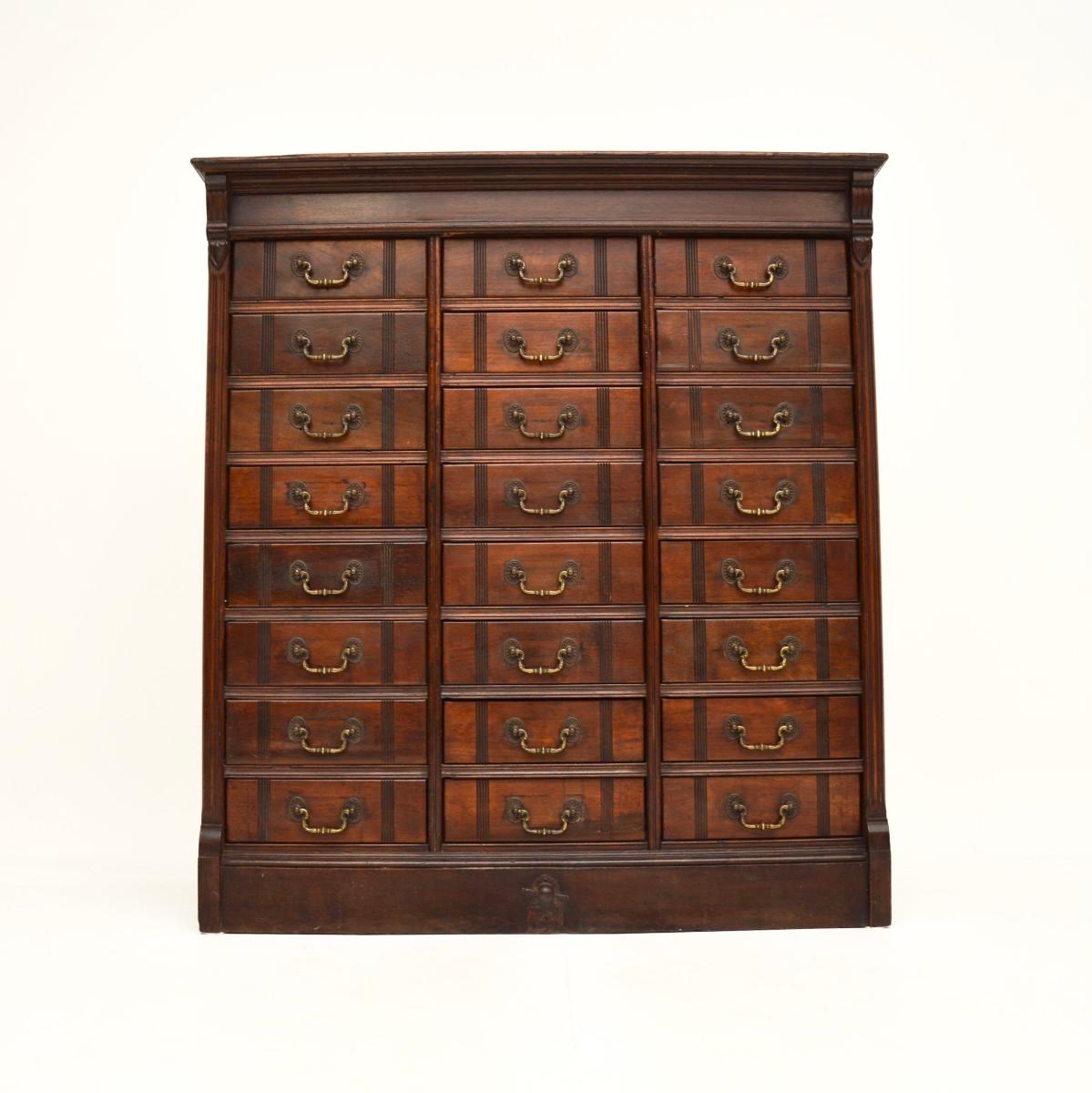 A large and impressive antique Victorian filing chest of drawers. This was made in England, we would date it to around the 1880-1900 period.

The quality is outstanding, this has a useful and interesting design. The many drawers all pull out