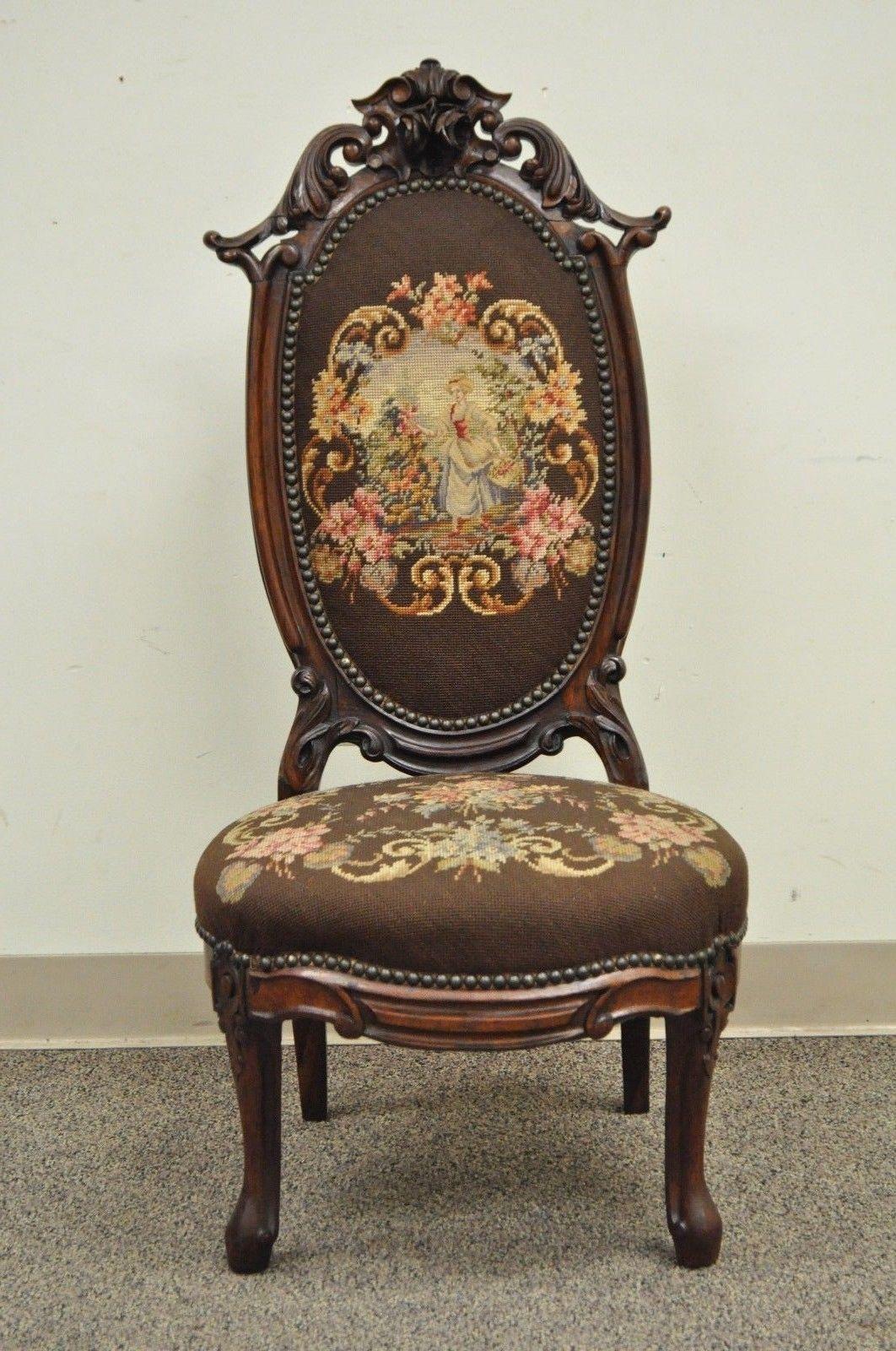 Antique Victorian finely carved rosewood needlepoint Prie Dieu accent side chair. Item features fine acanthus carved rosewood frame, brown needlepoint upholstery with floral and woman scene, brass nailhead trim, shapely legs, oval back and round