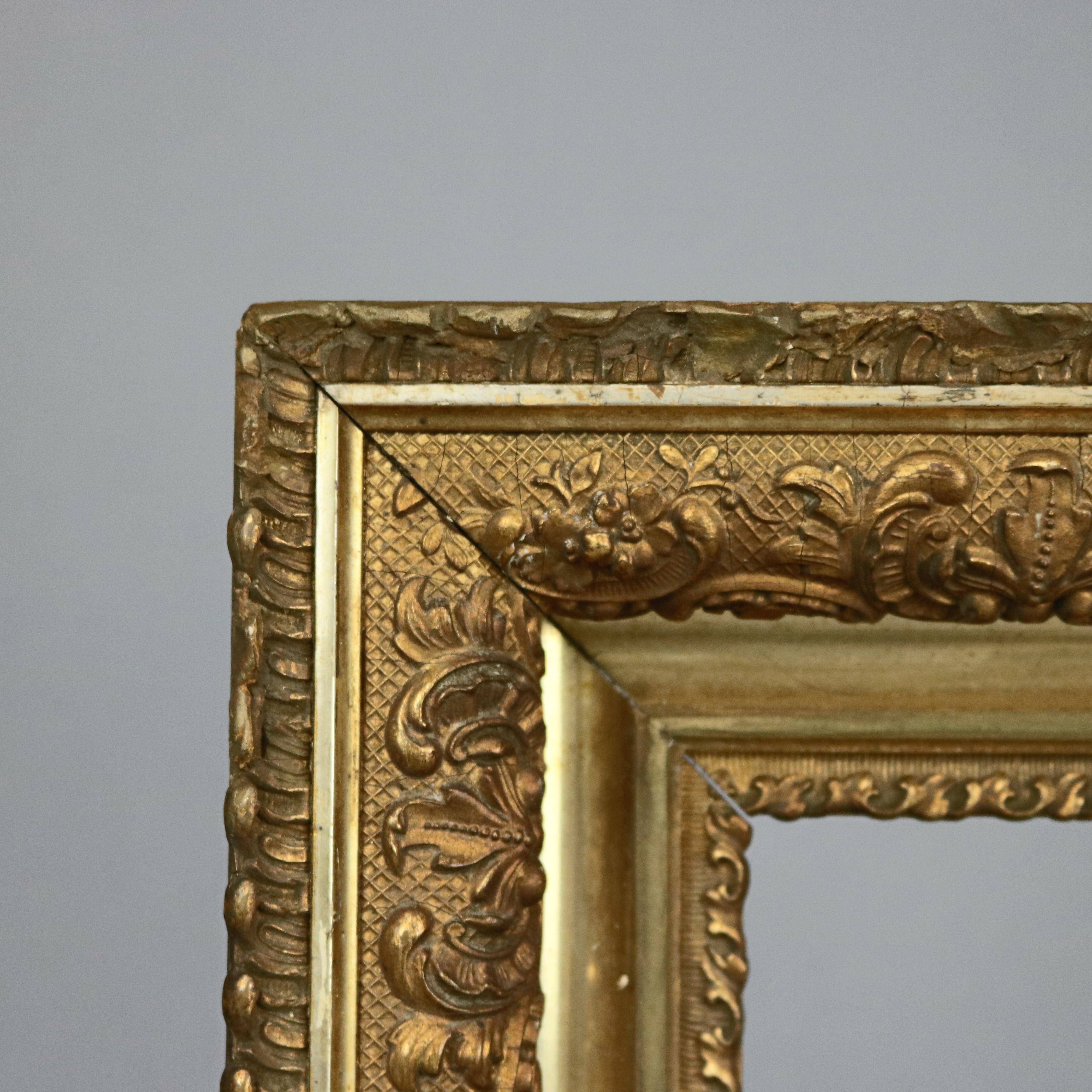 An antique Victorian art frame offers giltwood construction in first finish and with foliate, scroll and gadroon elements, c1890.

Measures: 17.75