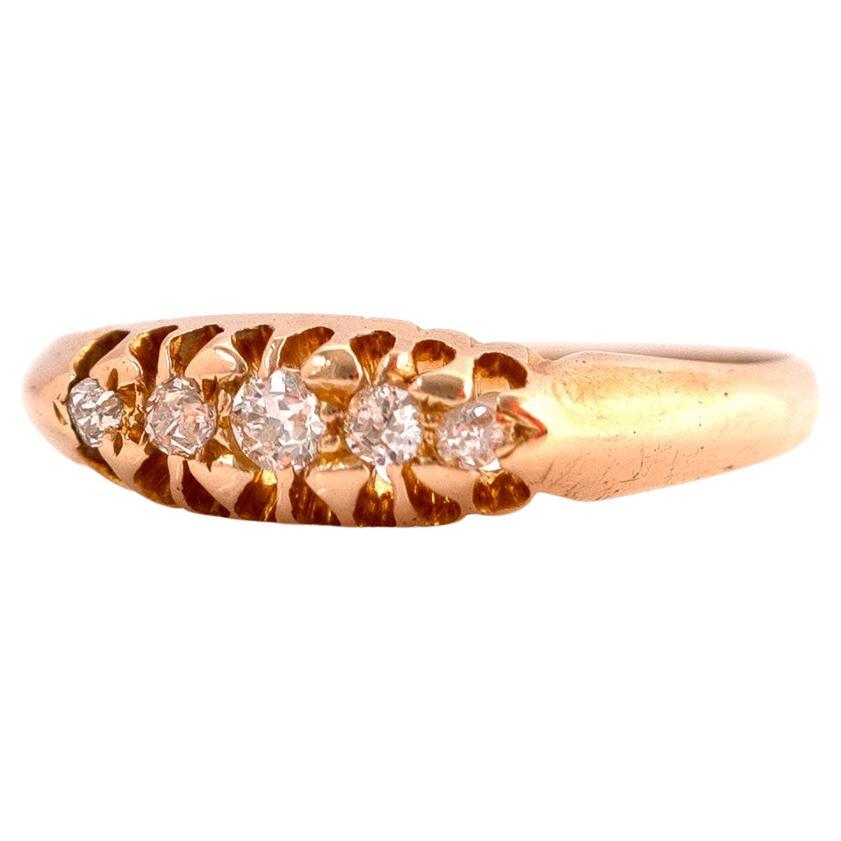 Antiguo anillo victoriano de cinco piedras y diamantes de oro de 18 ct