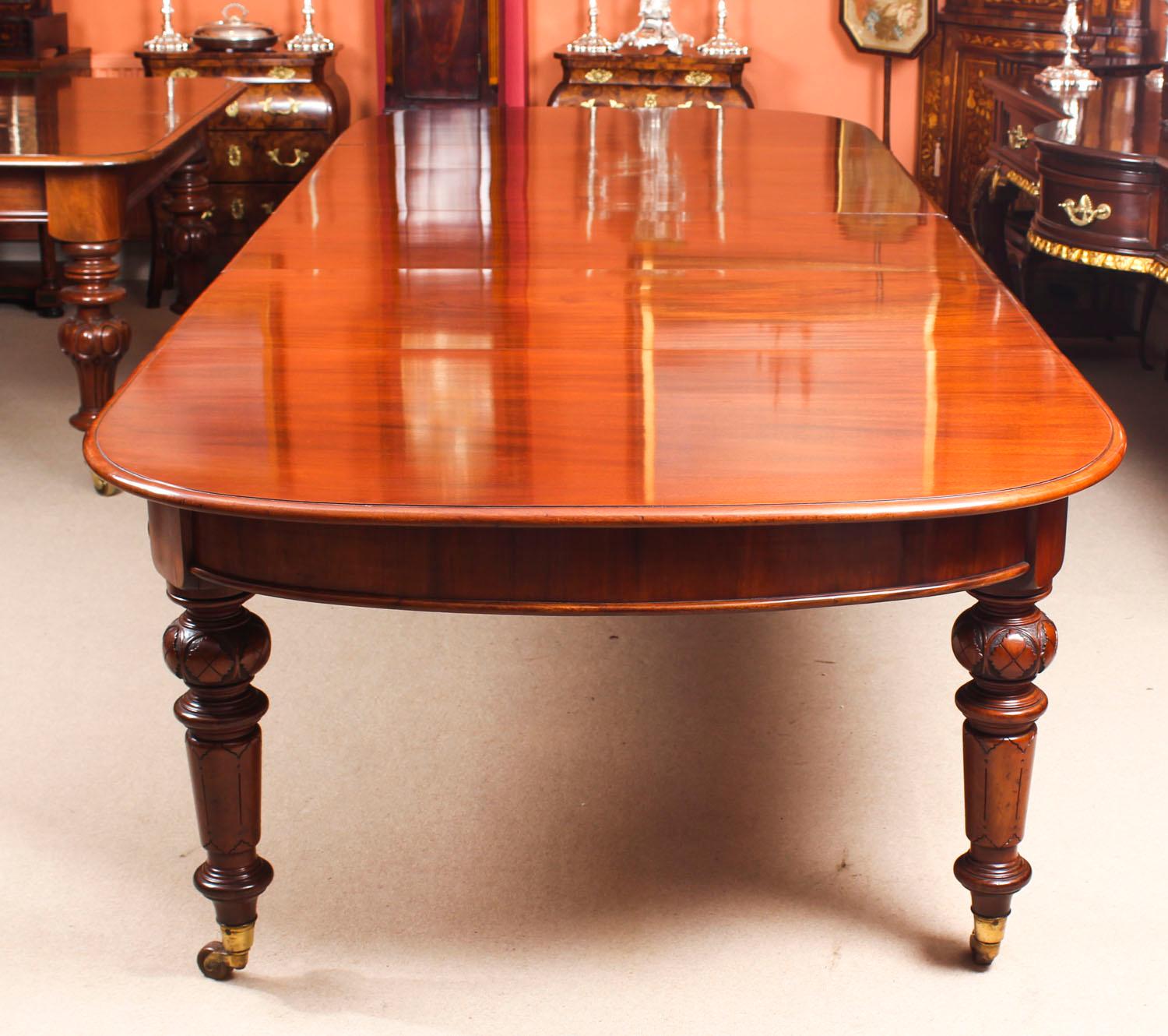This is a magnificent antique Victorian solid mahogany D-end dining table which can seat fourteen diners in comfort and is also ideal for use as a conference table, circa 1870 in date.
 
This beautiful table is in stunning flame mahogany and has