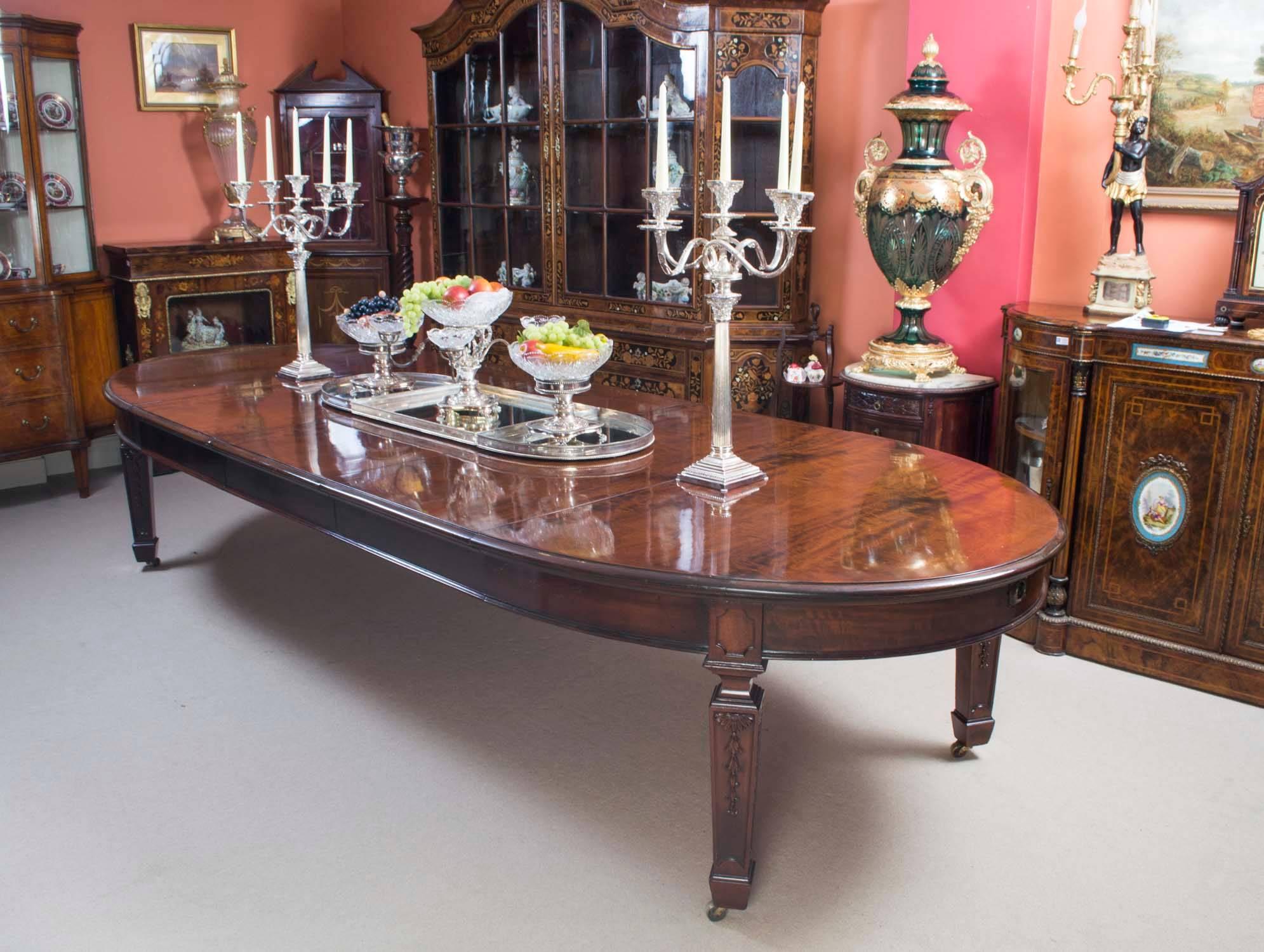 This is an extremely rare opportunity to own an antique Victorian oval extending dining table which can comfortably seat 12 and dates from circa 1880.

Made of flame mahogany this table is sure to get noticed wherever it is placed.
It has three