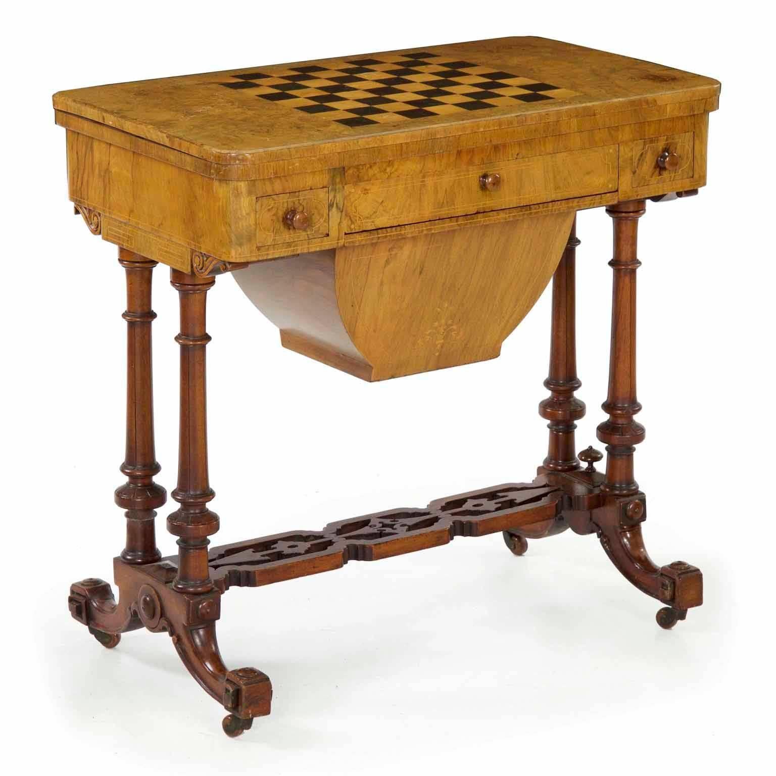 This is such a fun piece with a wealth of uses for enjoyment in the home. Designed first and foremost as a beautiful object, the table is very finely crafted in bleached burl walnut in the top and stained solid walnut in the base; this is