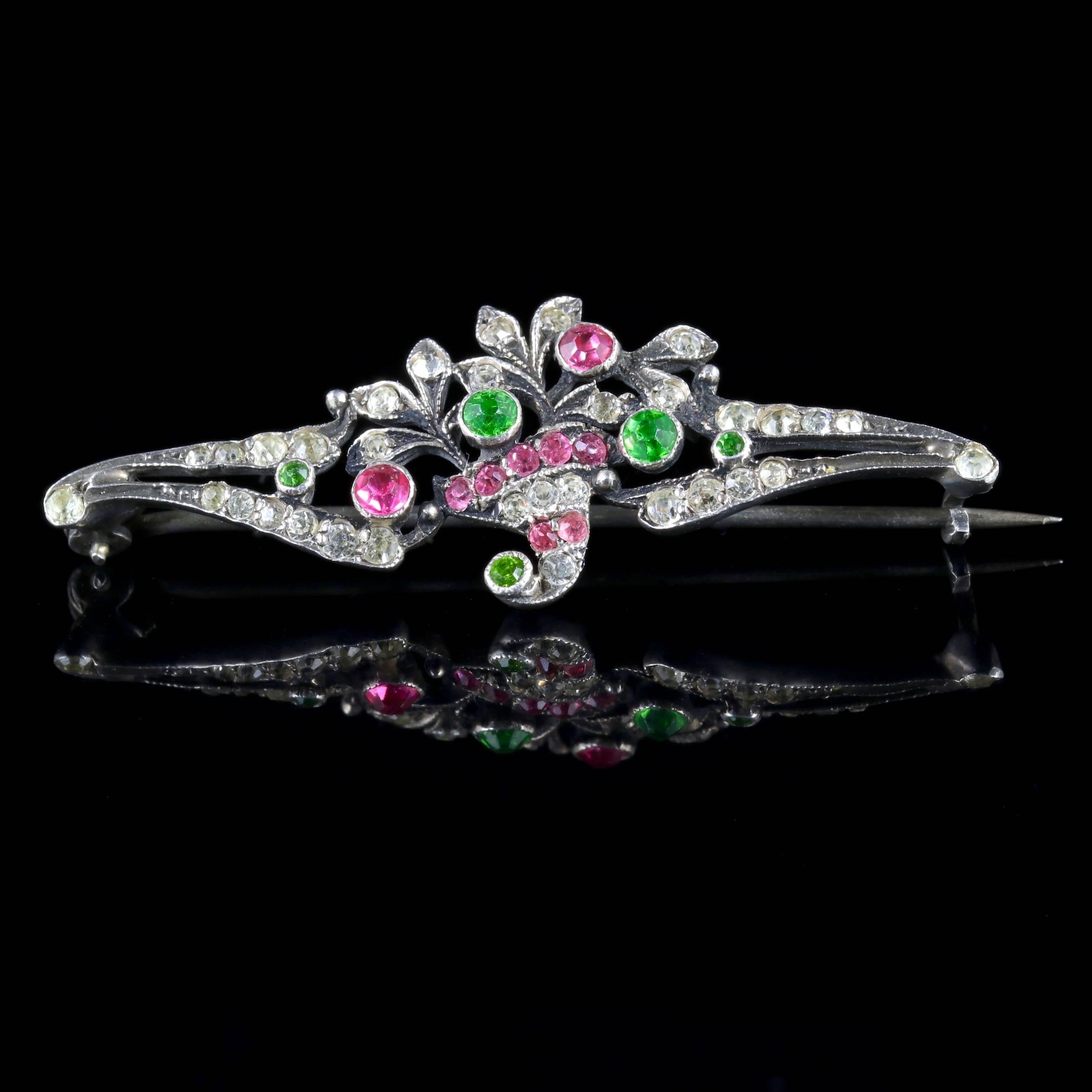This fabulous Victorian Suffragette brooch is Circa 1900.

The brooch displays a beautiful basket of flowers which is adorned in pretty pink, green and white sparkling Paste Stones, that represent the Suffragette movement.

Emmeline Pankhurst was