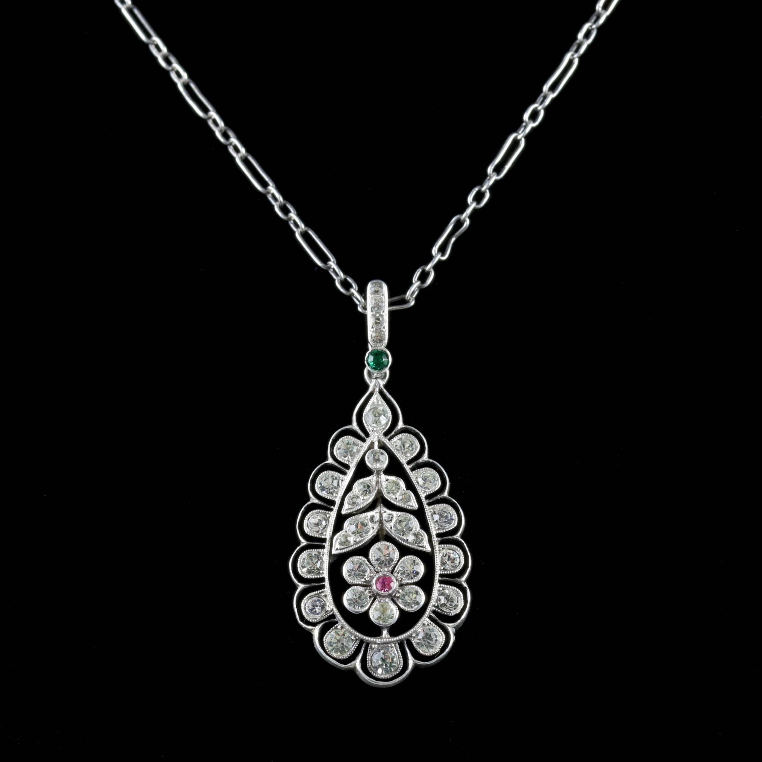 This fabulous antique Victorian flower pendant and chain was made representing the Suffragette movement, Circa 1900. 

The wonderful pendant is decorated in sparkling white, green and pink Paste Stones in a beautiful floral gallery.

Suffragettes
