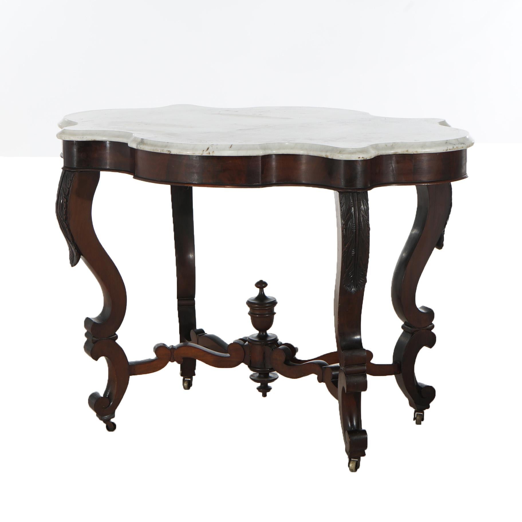 Antiker viktorianischer Tisch mit geschnitztem Nussbaum und abgeschrägter Schildkrötenplatte aus Marmor mit Cabriole-Beinen und zentraler Urne, um 1890

Maße - 29 