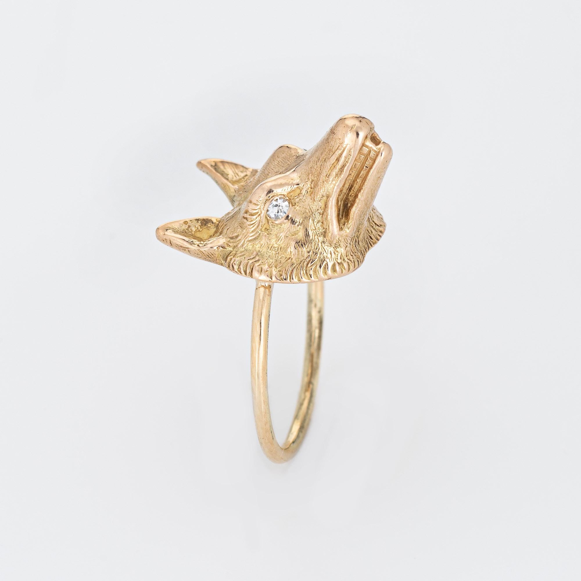 Originally an antique Victorian era stick pin (circa 1880s to 1900s), the fox is crafted in 14 karat yellow gold.

The ring is mounted with the original stick pin. Our jeweler rounded the stick pin into a slim band for the finger. The beautifully