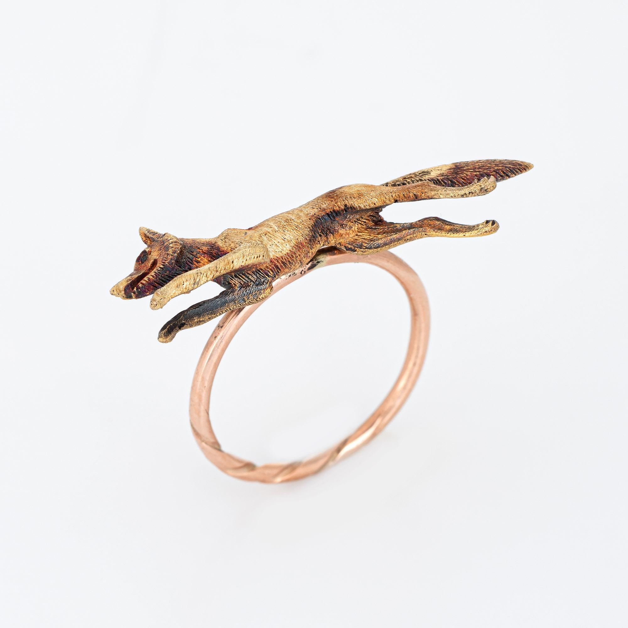 Originally an antique Victorian era stick pin (circa 1880s to 1900s), the fox is crafted in 14 karat yellow gold.

The ring is mounted with the original stick pin. Our jeweler rounded the stick pin into a slim band for the finger. The beautifully