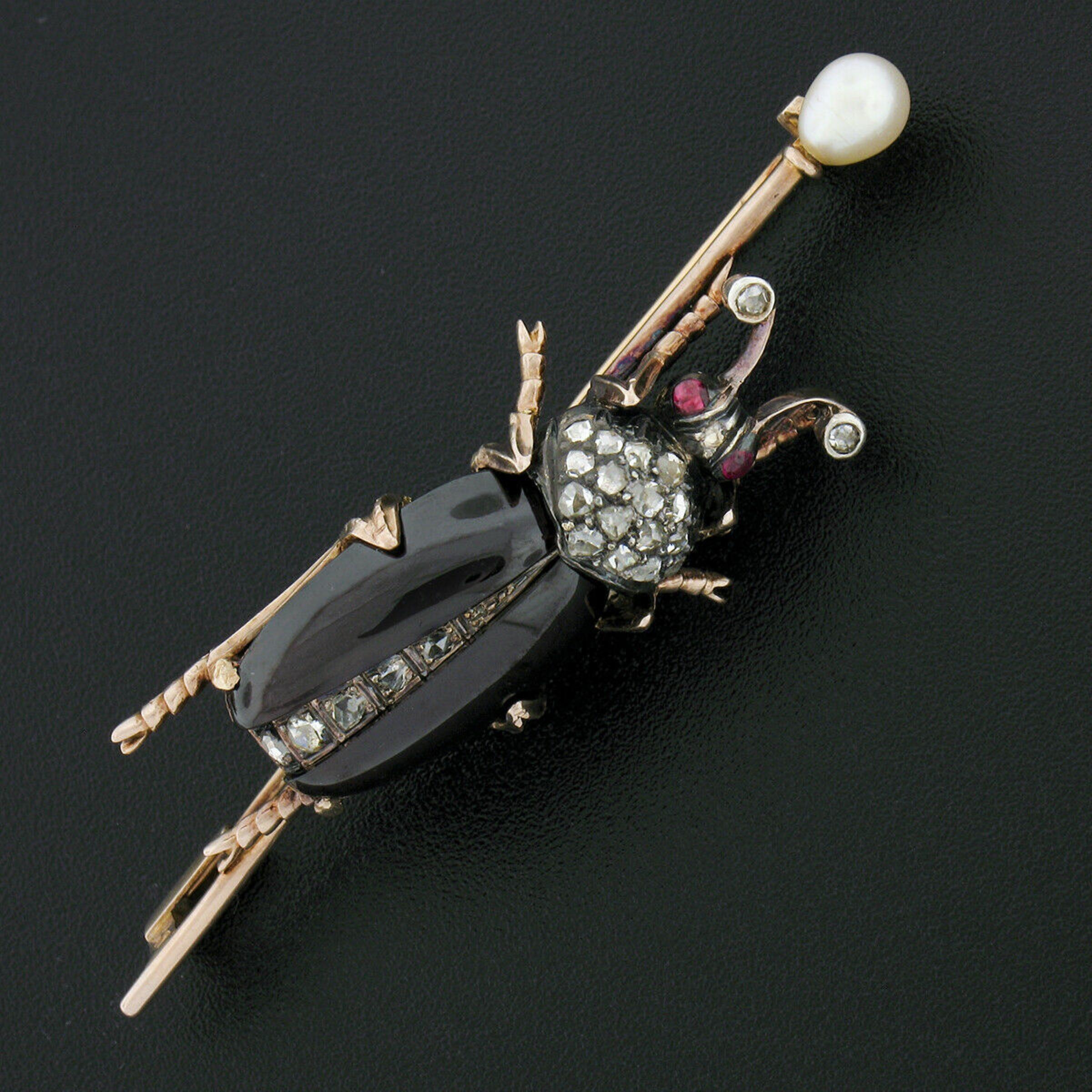 Here we have a very well made, antique, pin/brooch that was crafted in France from solid 18k gold and silver during the Victorian era. The brooch features a large beetle design that shows incredible detail and is neatly set with fine stones