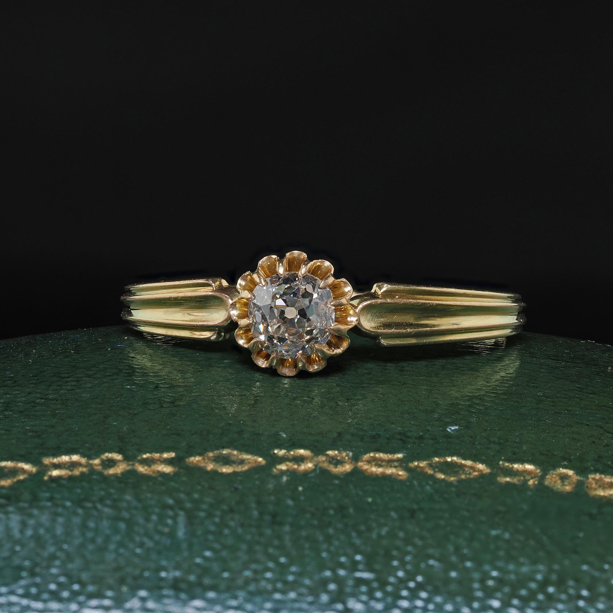Beautiful Antique Victorian French 18K Yellow Gold Old Mine Diamond Engagement Ring - GIA. This gorgeous antique French old mine diamond engagement ring is crafted in 18k yellow gold. The ring features a gorgeous chunky old mine cut diamond that has