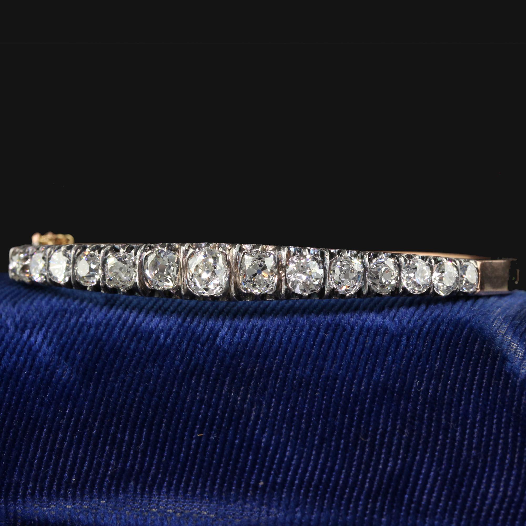 Beautiful Antique Victorian French 18K Yellow Gold Old Mine Diamond Line Bangle Bracelet. This incredible Victorian old mine diamond line bracelet is crafted in 18k yellow gold and silver. The top of the bangle has graduated old mine cut diamonds