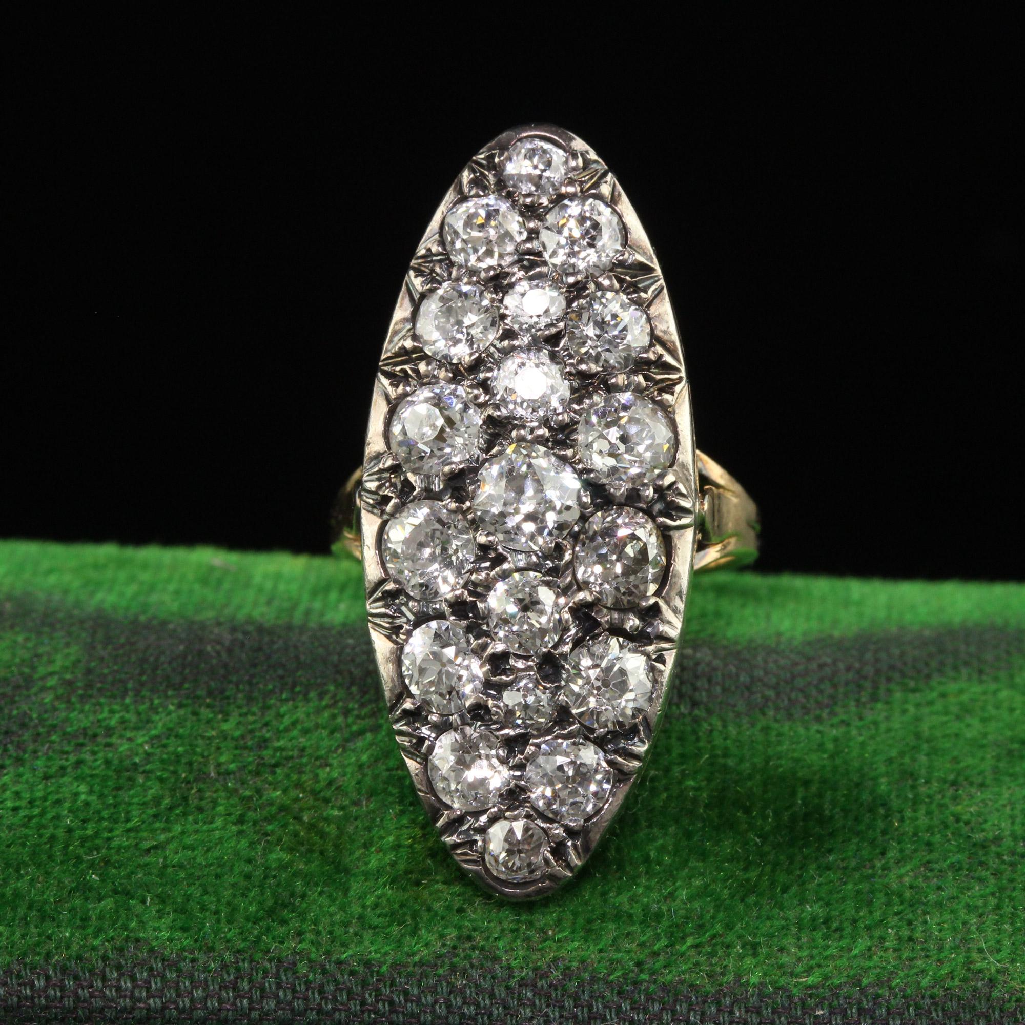 Beautiful Antique Victorian French 18K Yellow Gold Old Mine Diamond Shield Ring. This gorgeous Victorian old mine diamond shield ring is crafted in 18k yellow gold and silver top. This ring features gorgeous chunky old mine cut diamonds set