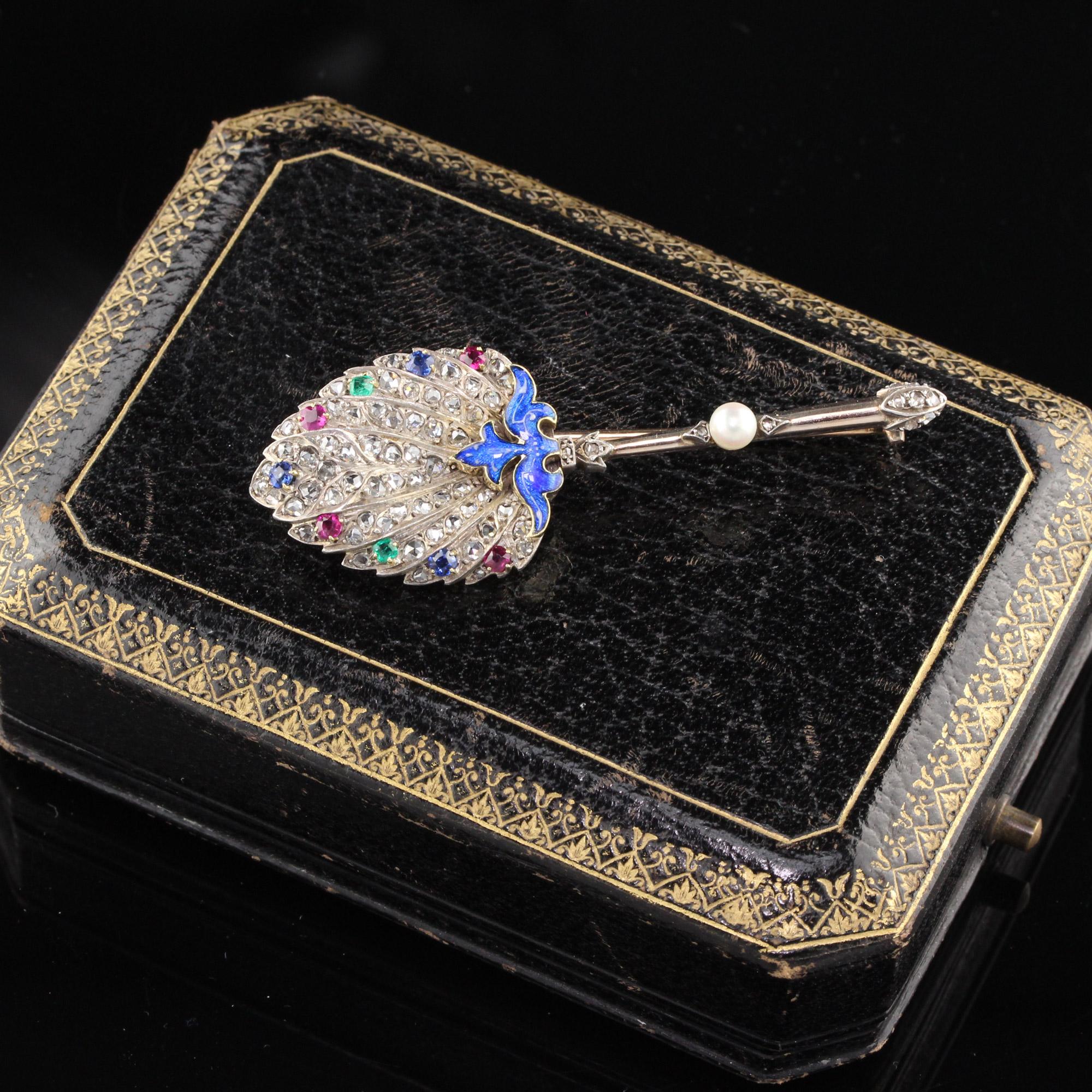 Magnificent Victorian 'feather' Brooch with chunky rose cut diamonds, rubies, emeralds, sapphires, royal blue enamel, and a natural pearl. The pin has French hallmarks and is fit for royalty! This is a unisex piece and would look incredible on a