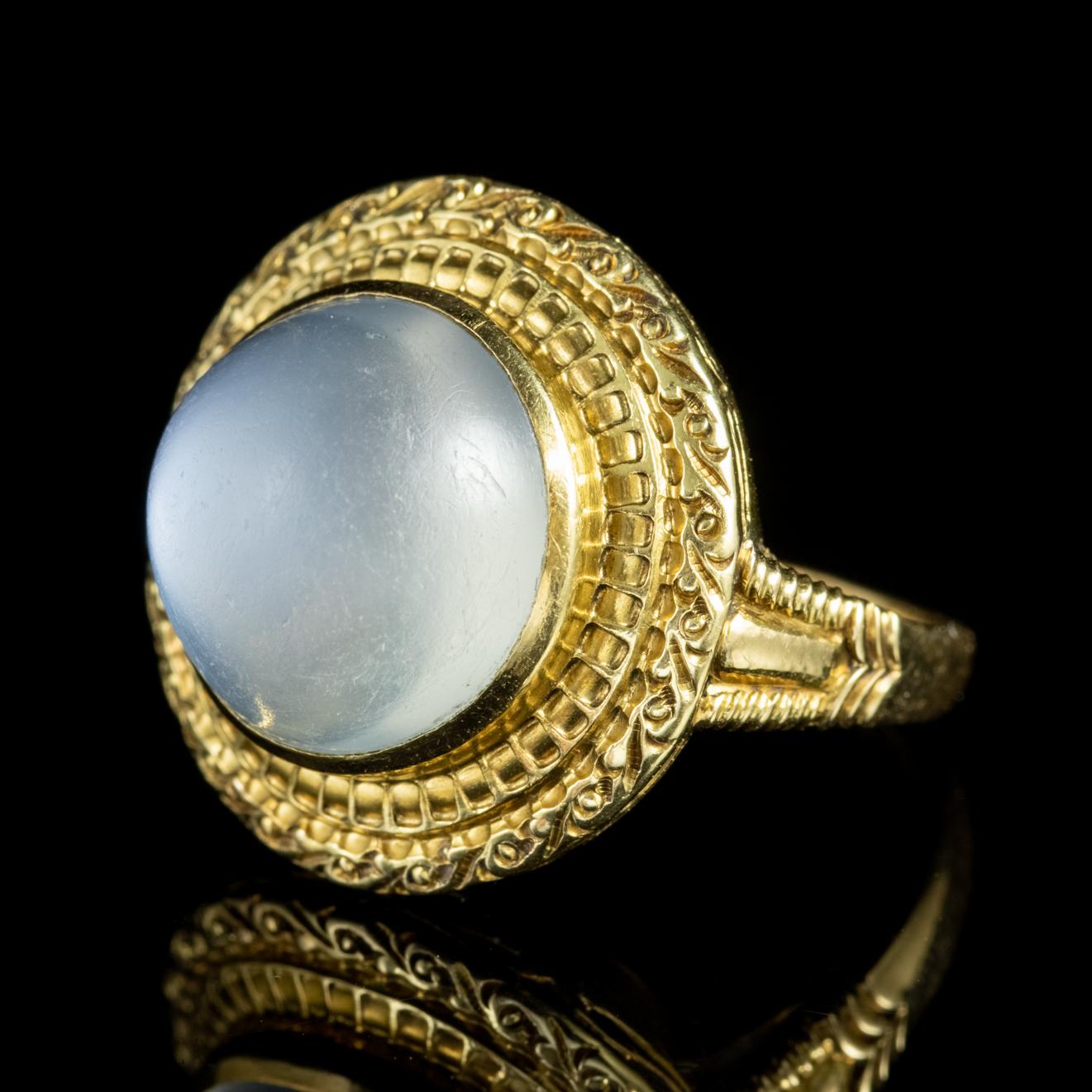 A striking antique French ring from the late 19th century adorned with a lovely cabochon Moonstone which is an impressive 12ct stone.    

The Moonstone has a lovely ghostly hue and a luminous surface similar to that of Moonlight. They are said to