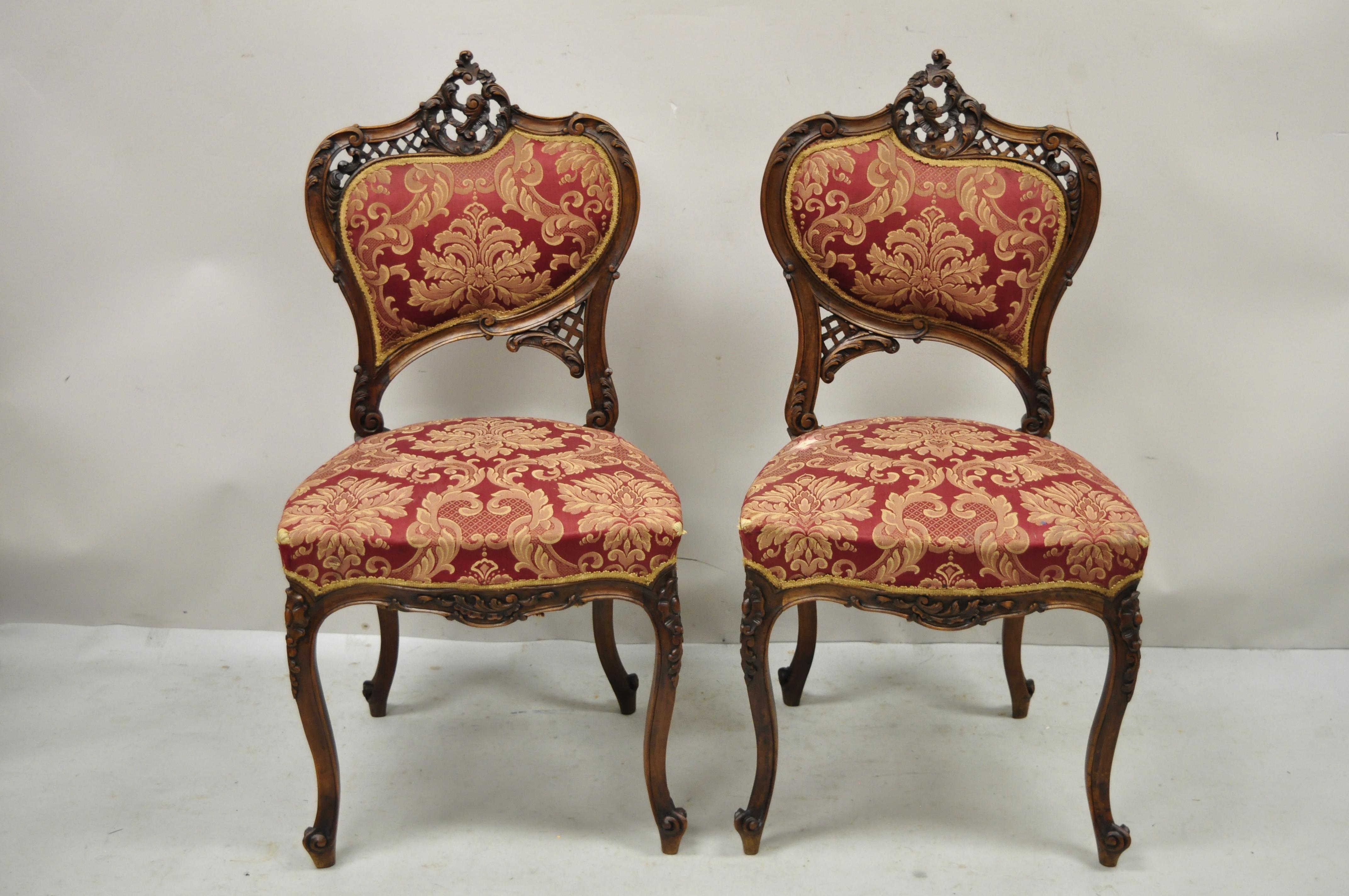 Antique Victorian French carved mahogany parlor accent side chairs - a Pair. Item features solid wood frames, nicely carved details, cabriole legs, very nice antique pair, quality craftsmanship, great style and form. Circa Early 1900s. Measurements: