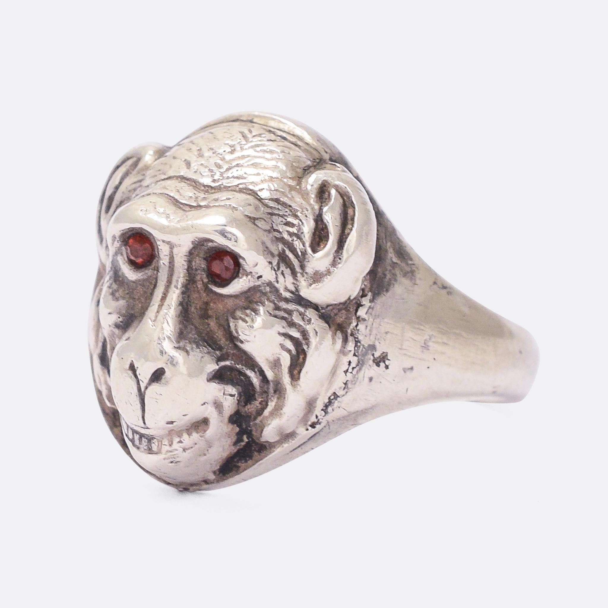 A highly unusual antique French ring, the head modelled as a realistic depiction of a monkey/chimpanzee. It's incredibly well detailed, crafted in silver and set with ruby eyes. Dating from the late Victorian period, circa 1900.

STONES 
Ruby

RING