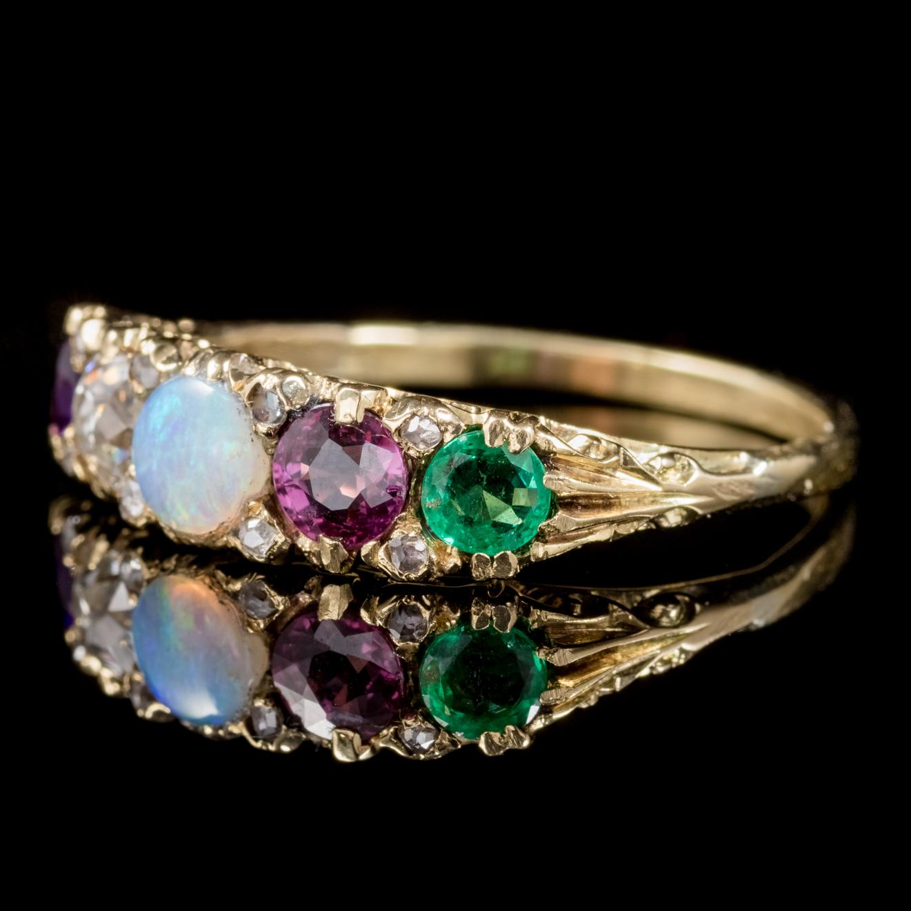 This colourful antique 18ct Gold Gemstone ring is Victorian Circa 1900.

The gemstones in the gallery spell out the word ‘ADORE’ with each first letter - Amethyst, Diamond, Opal, Ruby and Emerald.

Sentiment rings or ADORE rings were popular in the