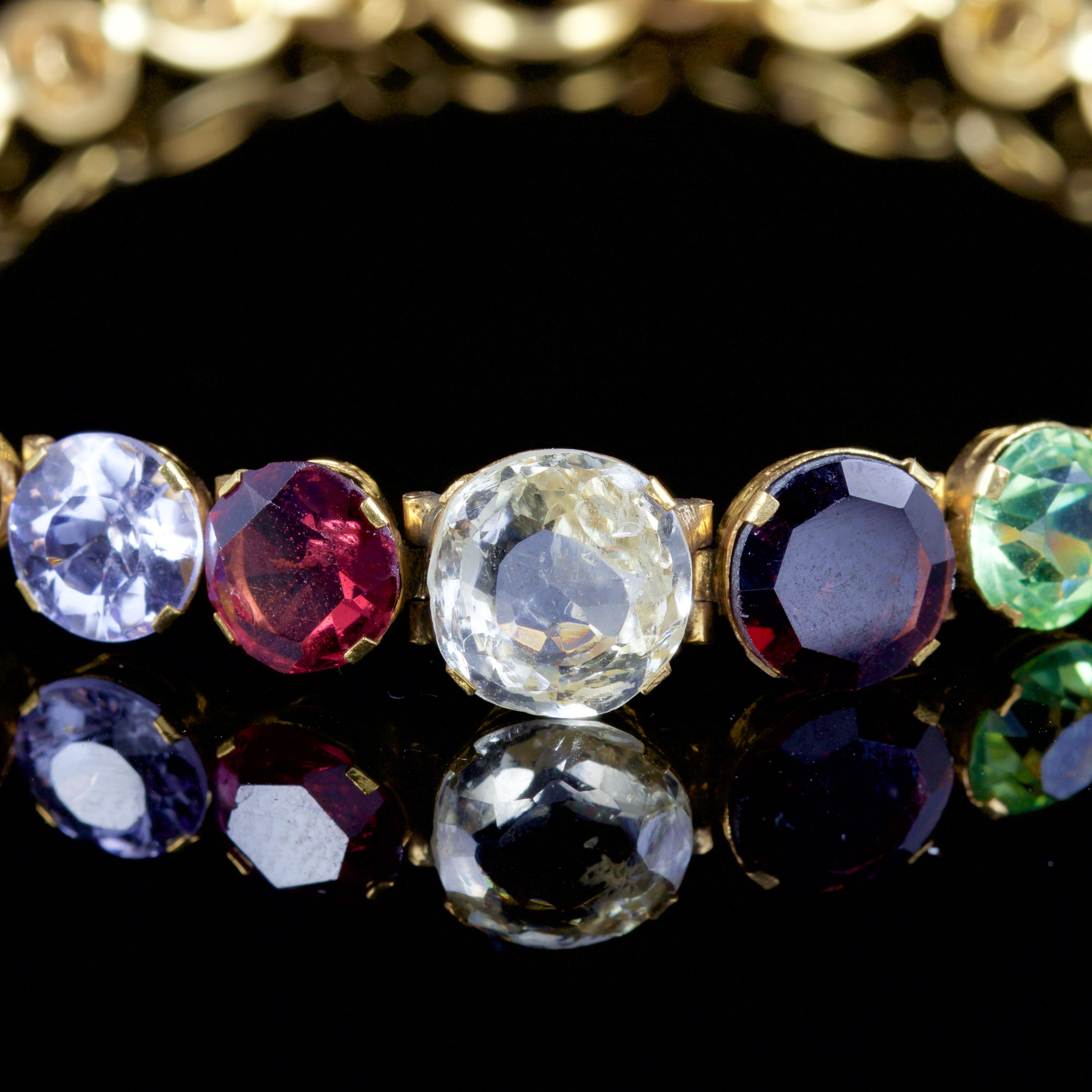 This genuine Victorian multi-gemstone bracelet is, Circa 1880.

The gemstones comprise of a White and Yellow Sapphire, Garnet, Peridot, Citrine and a green Garnet, it is a beautiful combination of gemstones.

Sapphire is the symbol of feelings of