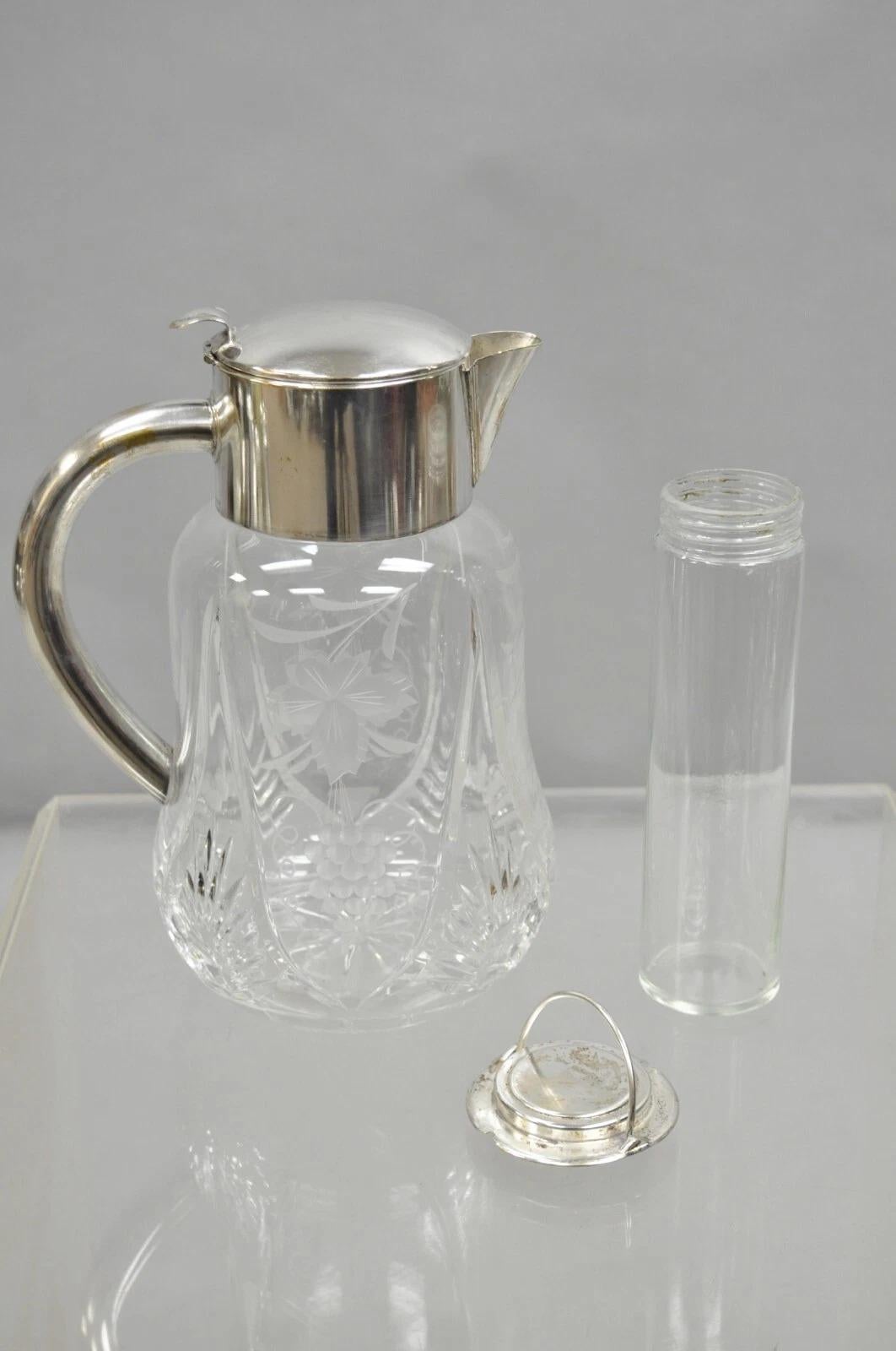 Antique Victorian German Silver Plated Cut Crystal Glass Lemonade Water Pitcher with Glass Ice Cube Liner. Made in Western Germany. Circa Early 20th Century. Measurements: 11