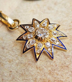 Antico ciondolo vittoriano GIA in oro 19K con diamante Old Mine da 1,21ctw e smalto blu.